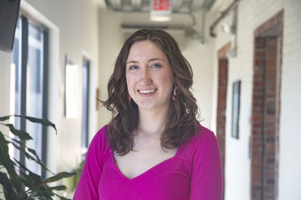 Maddie Bartlett smiling for a photo.