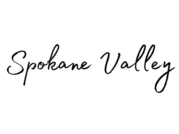 Handwritten style text that says 'Spokane Valley' in white on a black background.