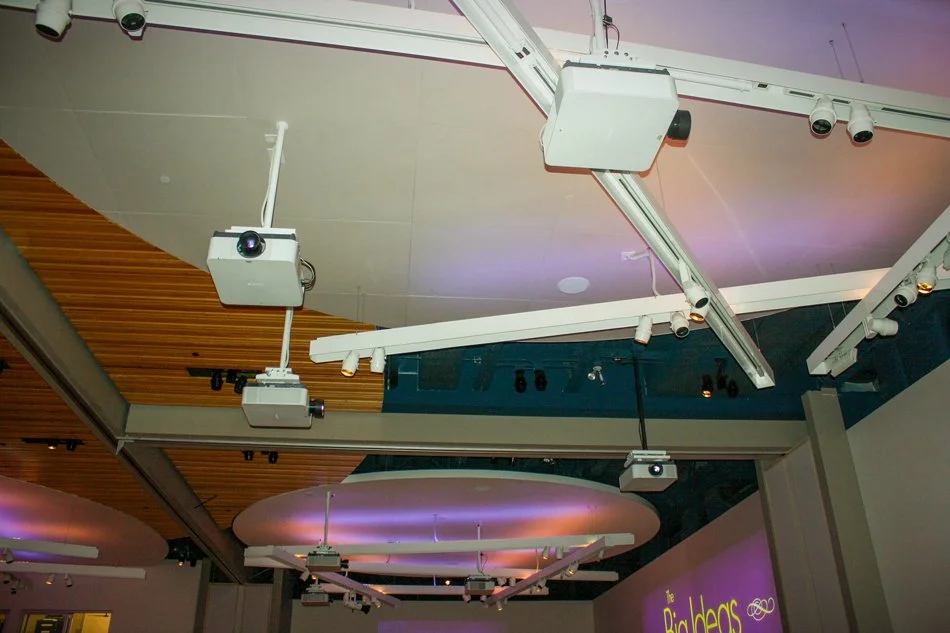 Ceiling-mounted laser projectors and audiovisual equipment installed throughout the MSU Mankato Centennial Student Union Ballroom.