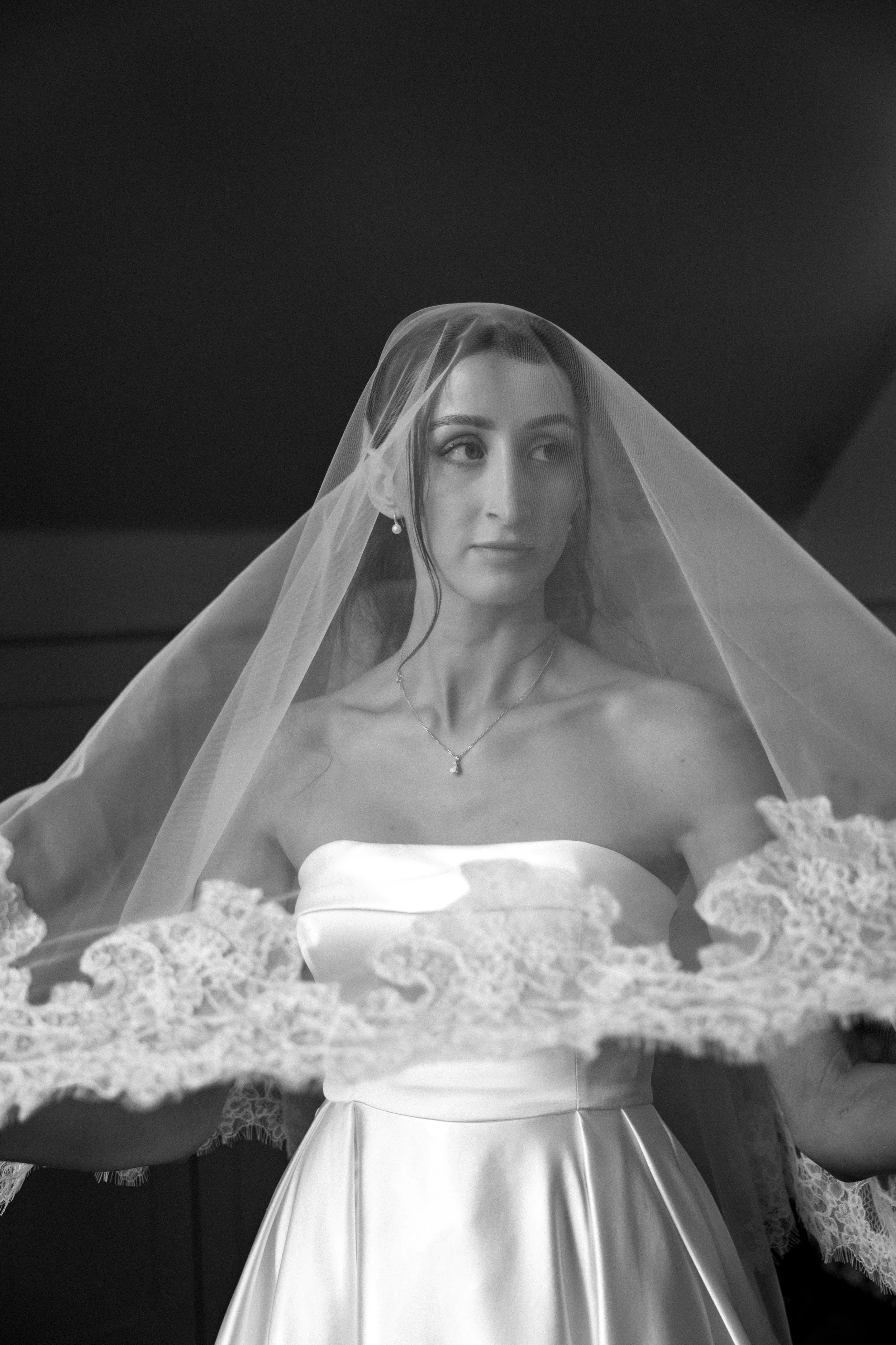 Black and white bridal portrait with veil