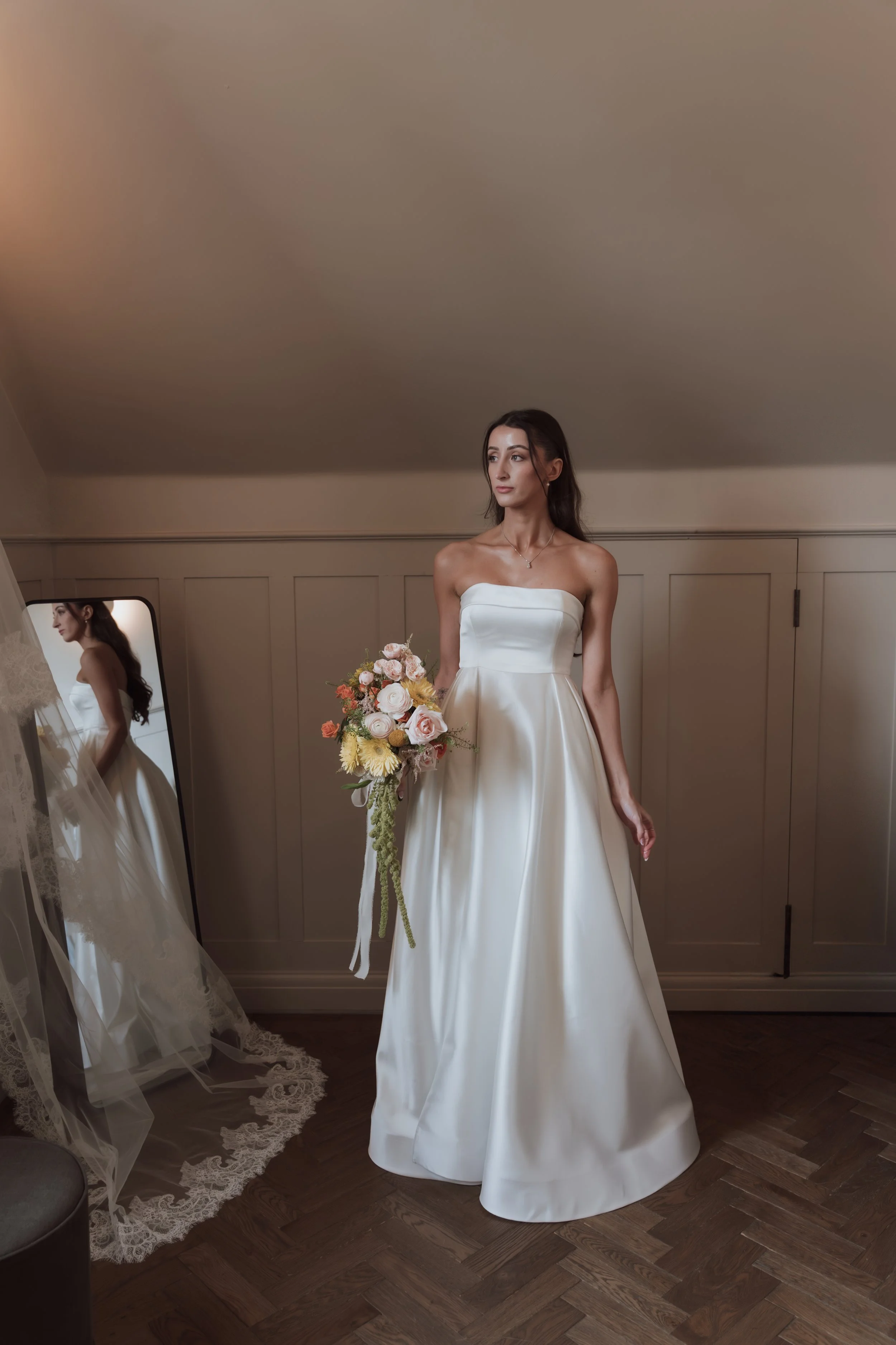 Editorial bridal portrait with mirror reflection