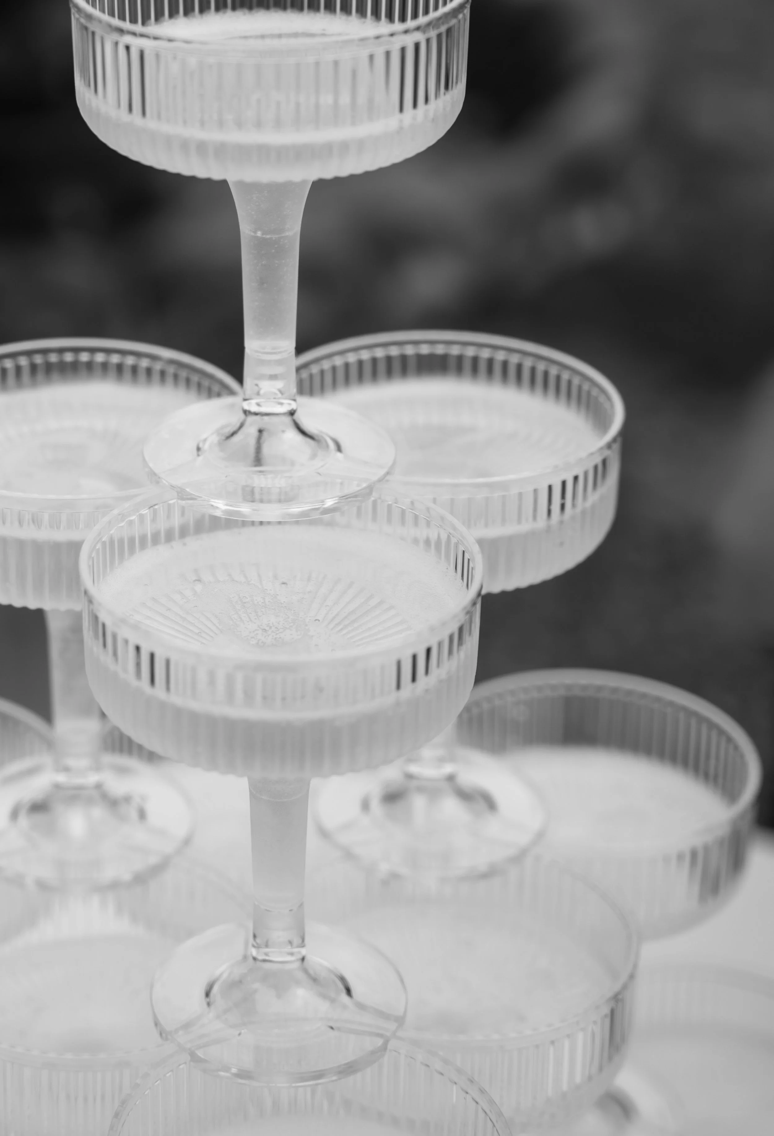 Black and white champagne tower wedding detail
