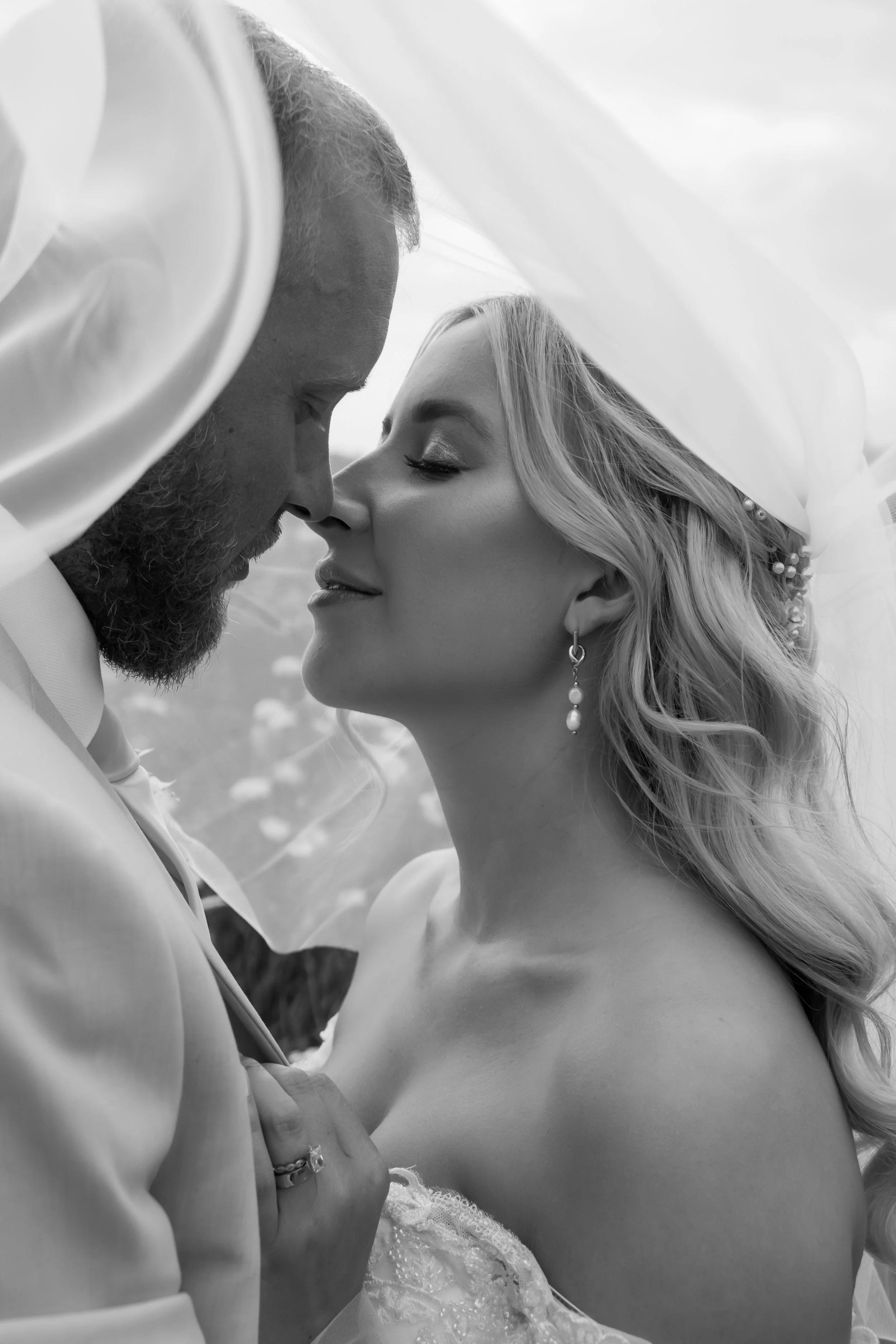 Intimate black and white wedding close-up
