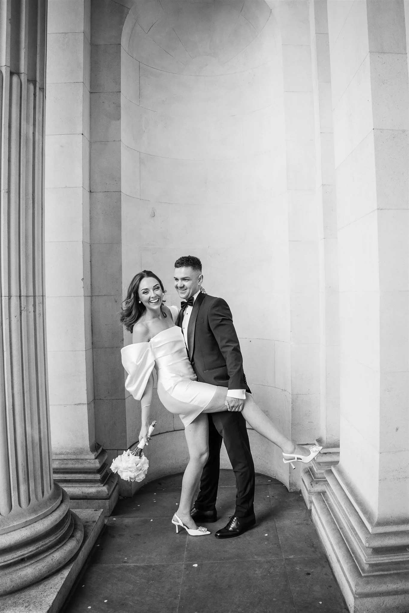 Editorial wedding couple portrait with classical architecture