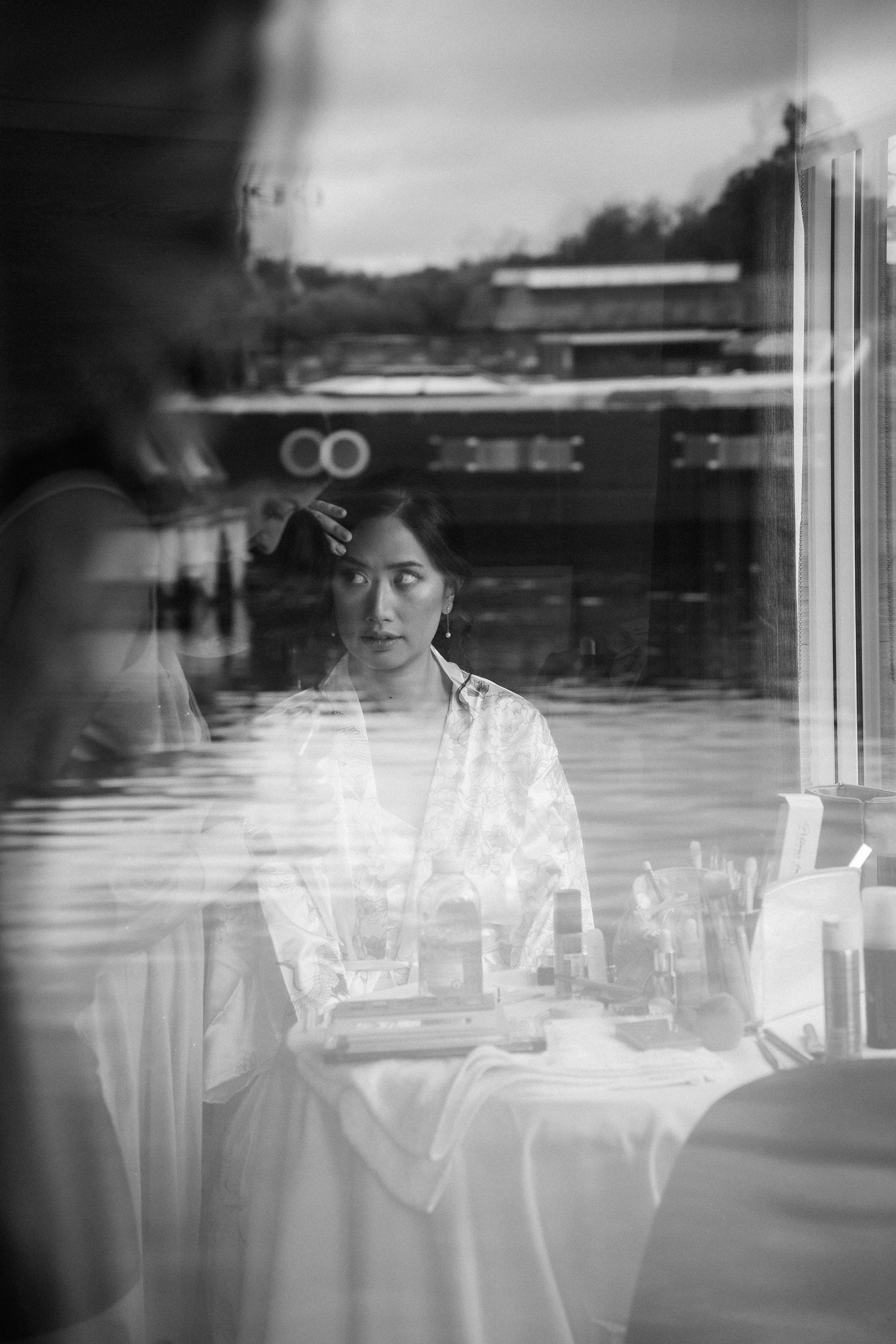Editorial black and white bridal reflection portrait
