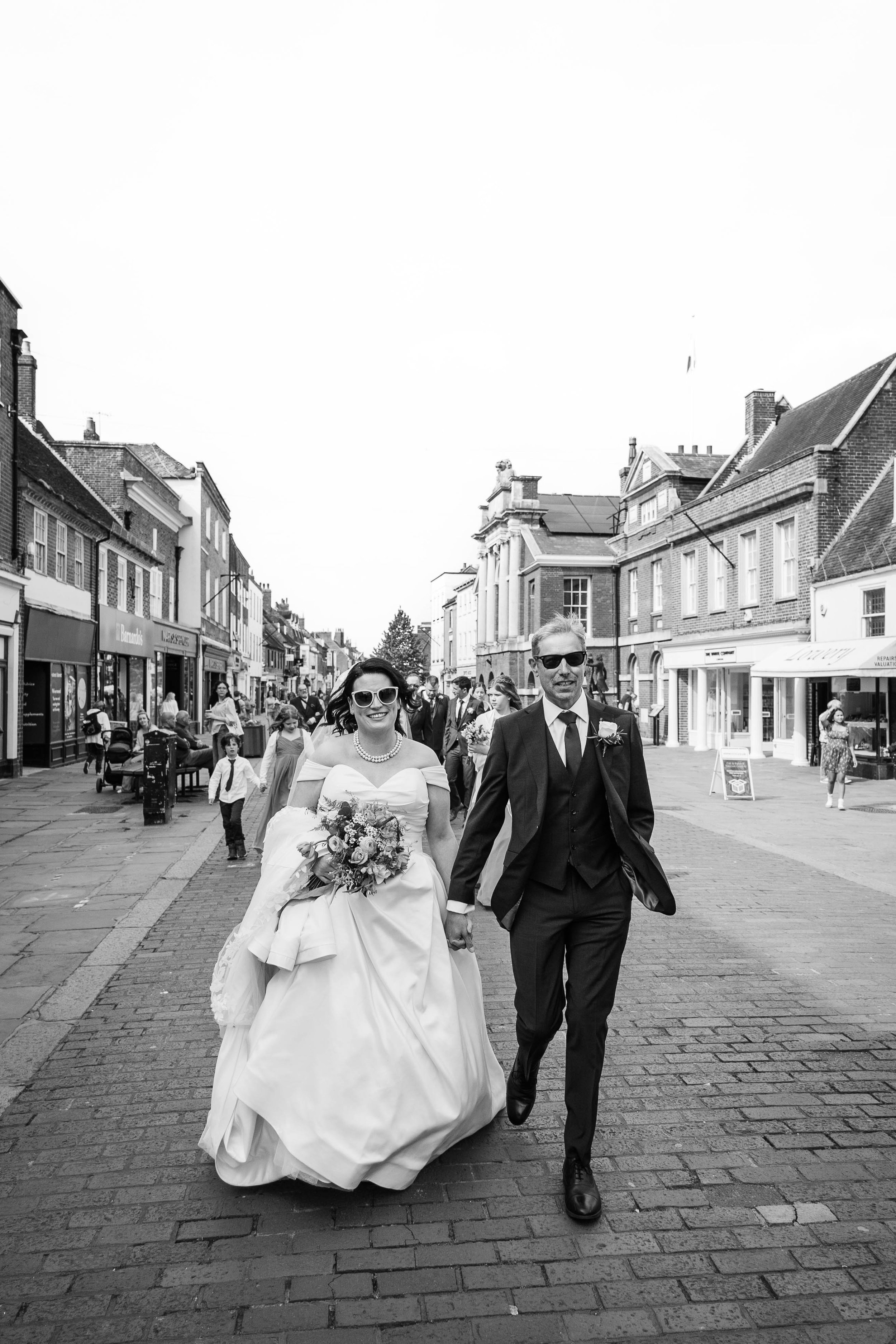 City wedding couple walking portrait
