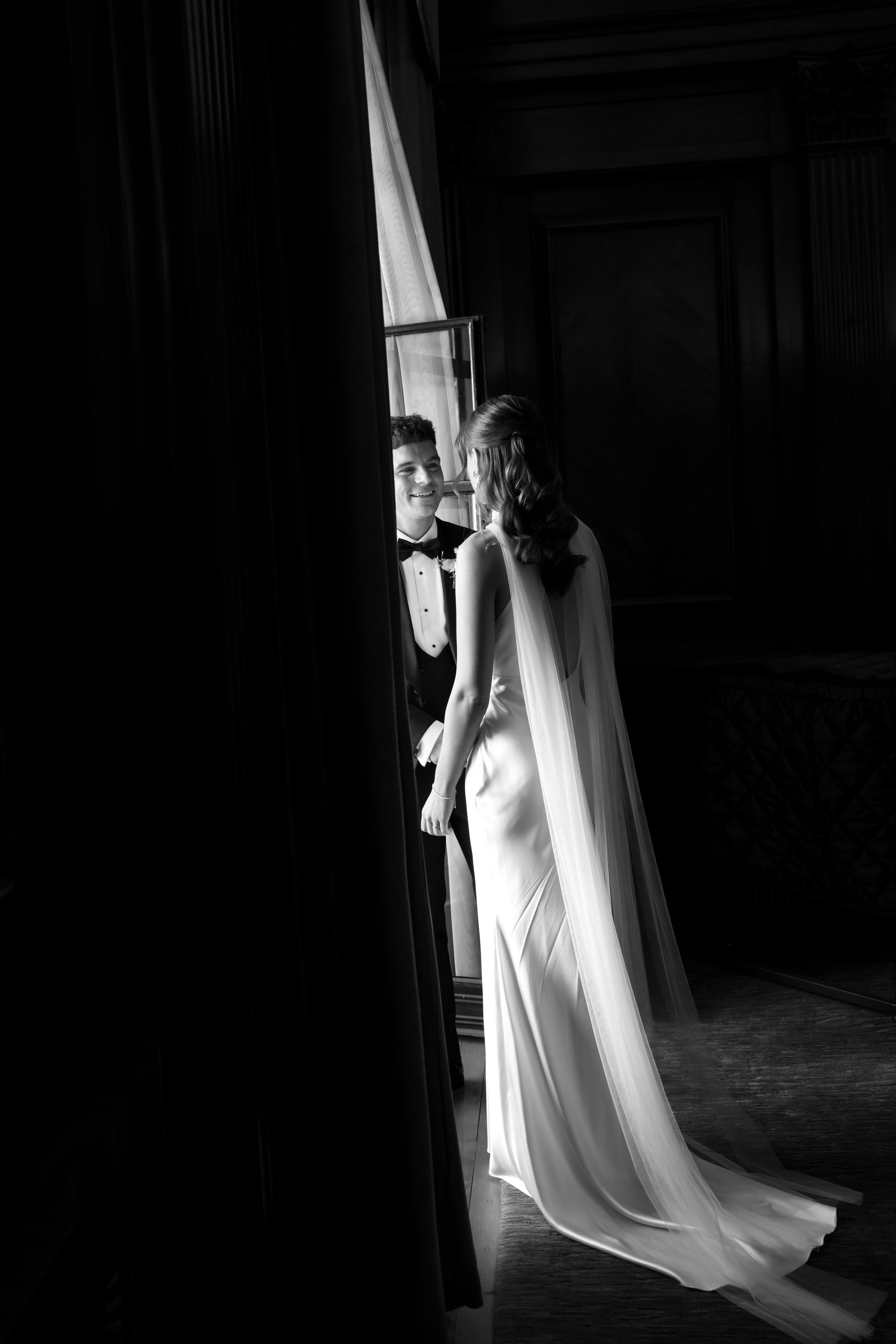 Black and white portrait of couple in wedding ceremony