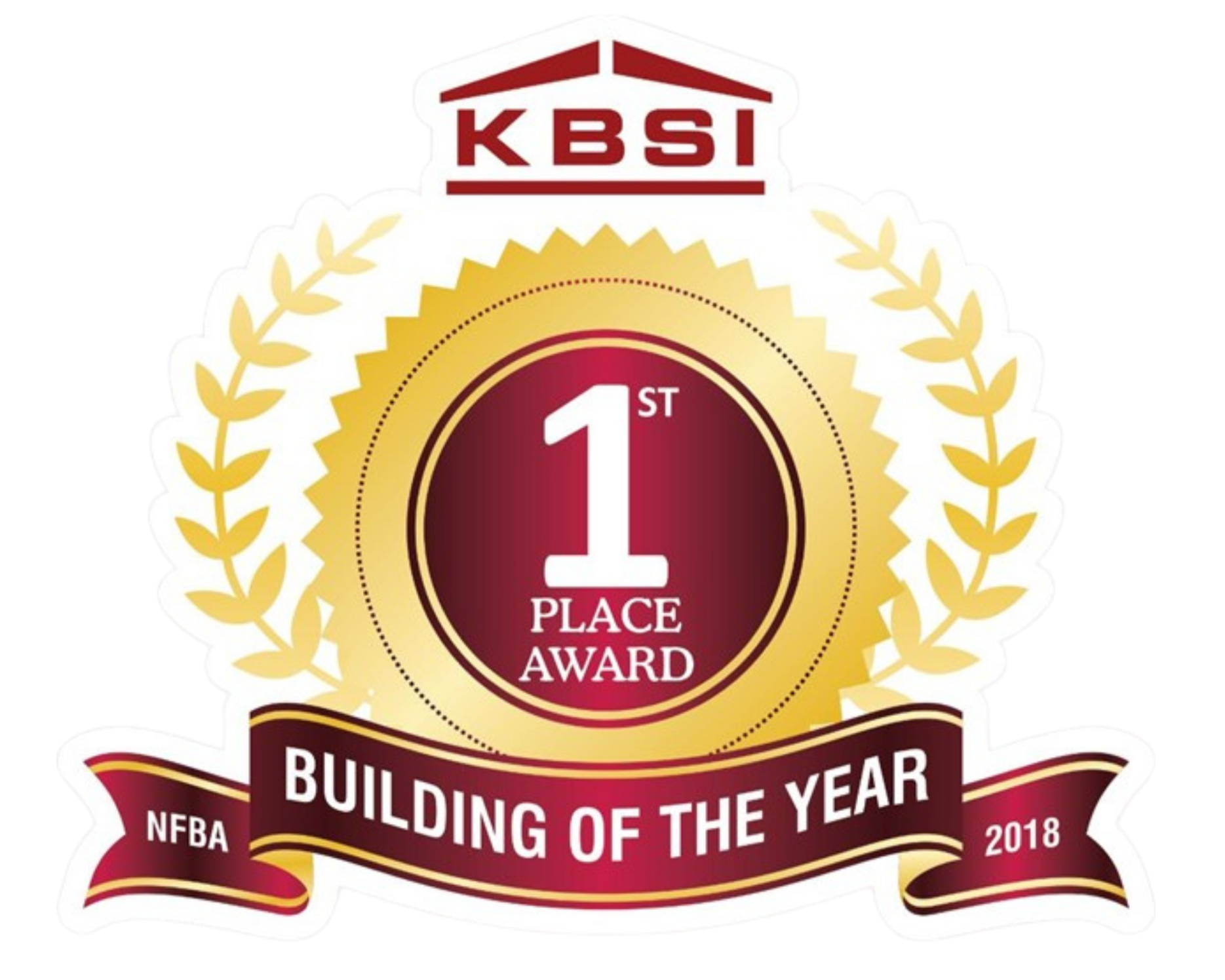 A badge or award ribbon with a red, white, and gold color scheme. It features the KBSI logo at the top, a gold laurel wreath around a red circle with the white number '1' and 'st' written beside it, and a maroon banner at the bottom with the text 'BUILDING OF THE YEAR' and the year 2018.