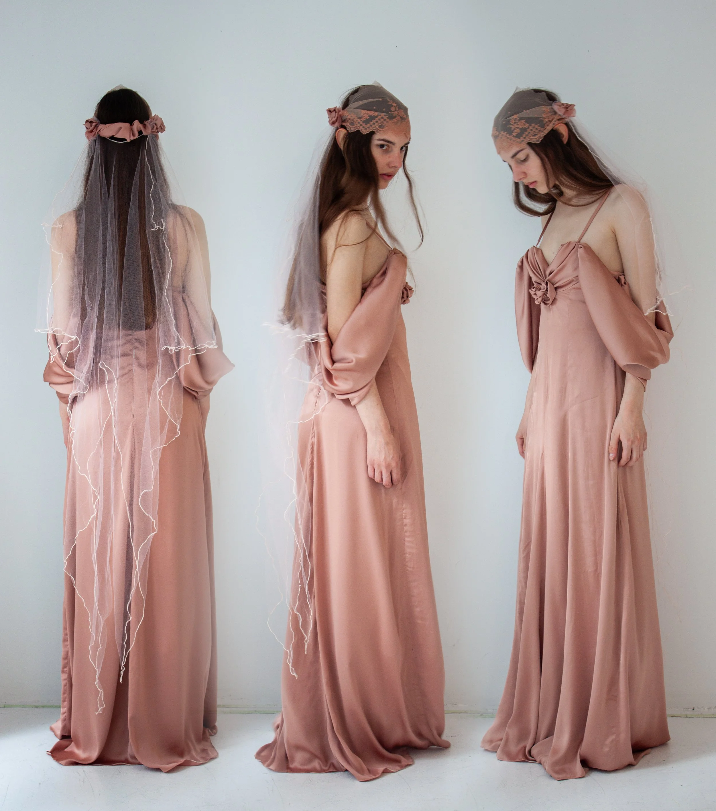 A silk gown made by Emma Audrey Newman, featuring a tulle and recycled lace veil made by Melody Ann Gallant.
