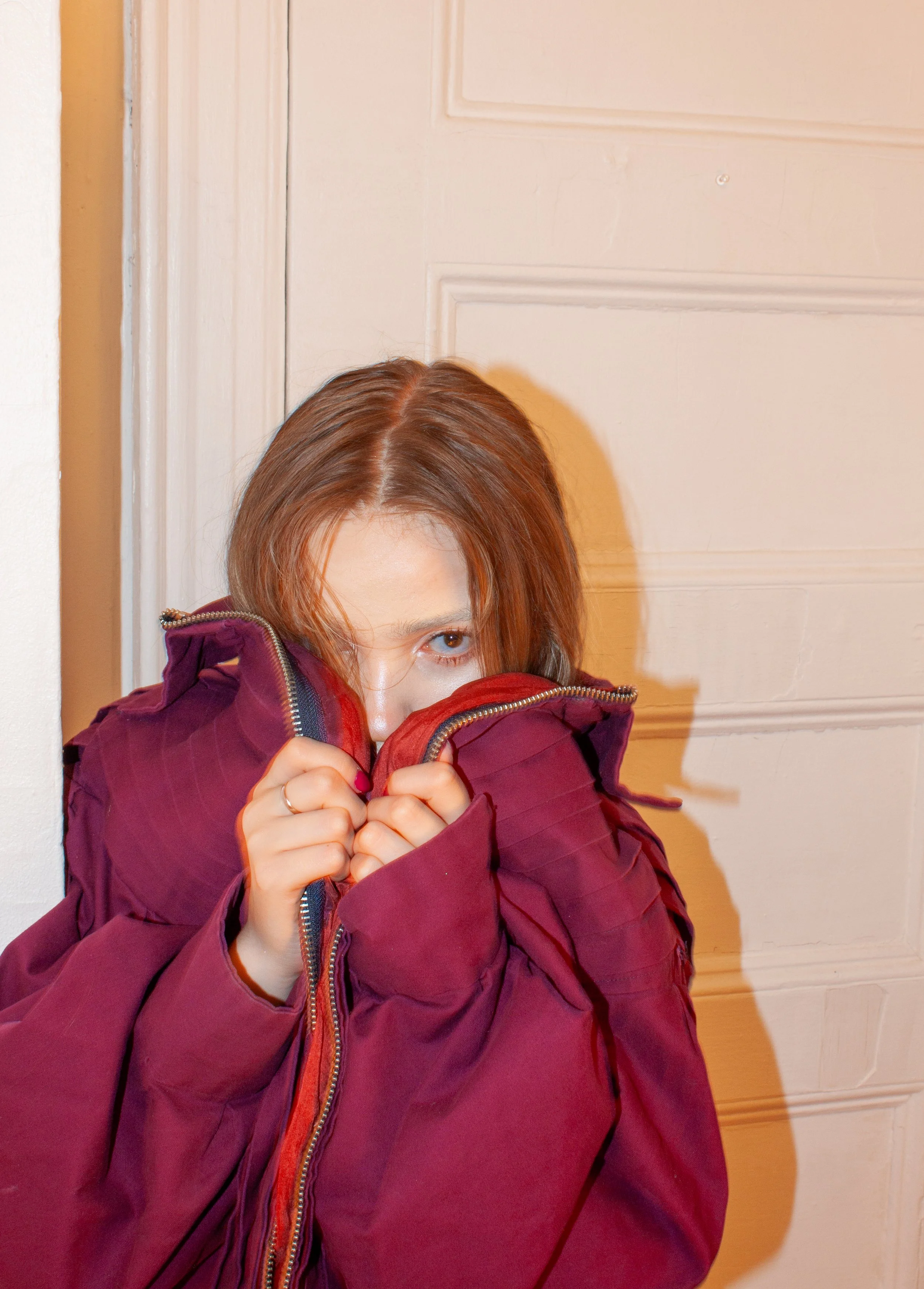 Plum, pleated cotton jacket. Striped silk lining. Reversible silver zipper. Box pleated balloon sleeve. 