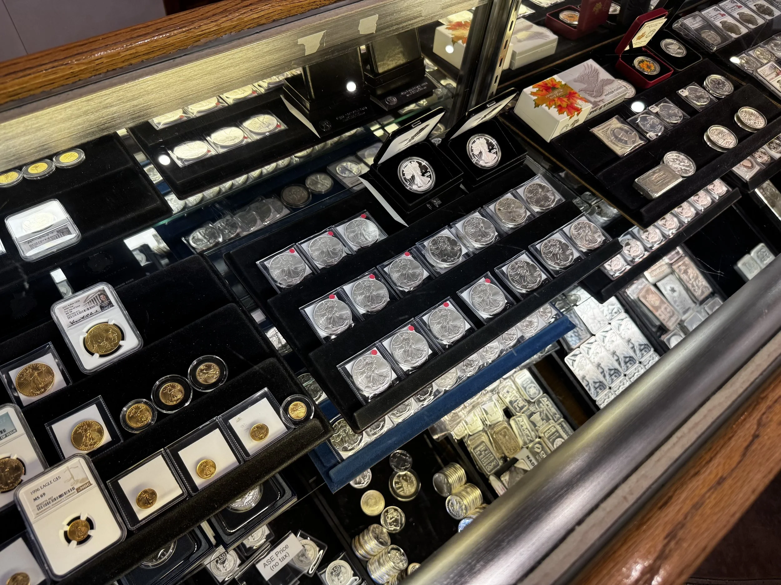 Gold bullion and collectible gold coins evaluated by Sahara Coins in Las Vegas.