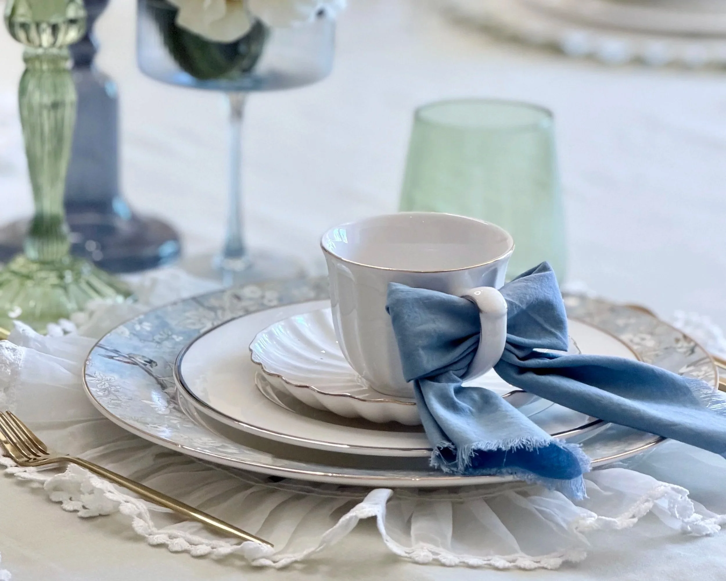 Afternoon tea table with china and a three-tier stand, styled by Casa Zaara in San Diego.