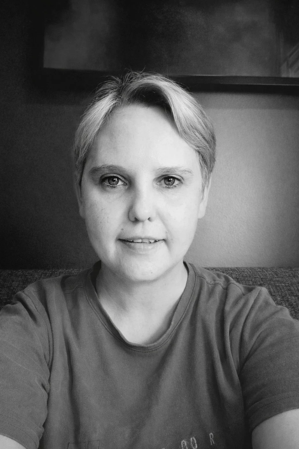 Black and white portrait of author Morrigan Crowe.