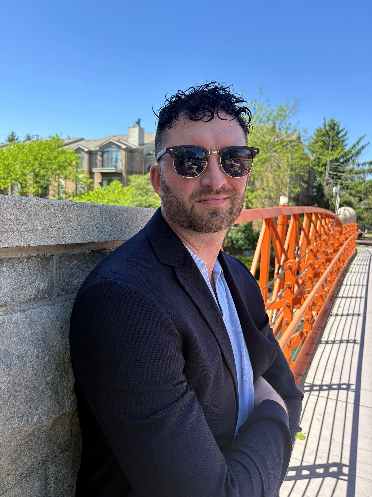 Patrick Michaud, founder of Ascendant Advising Group, smiling outdoors in a navy blazer in Indianapolis Indiana