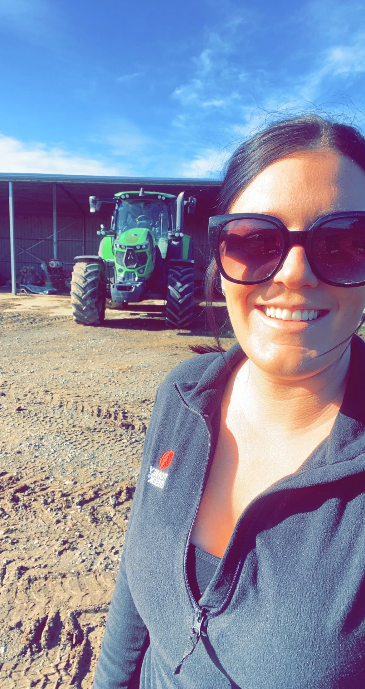 Farmer in front of tractor