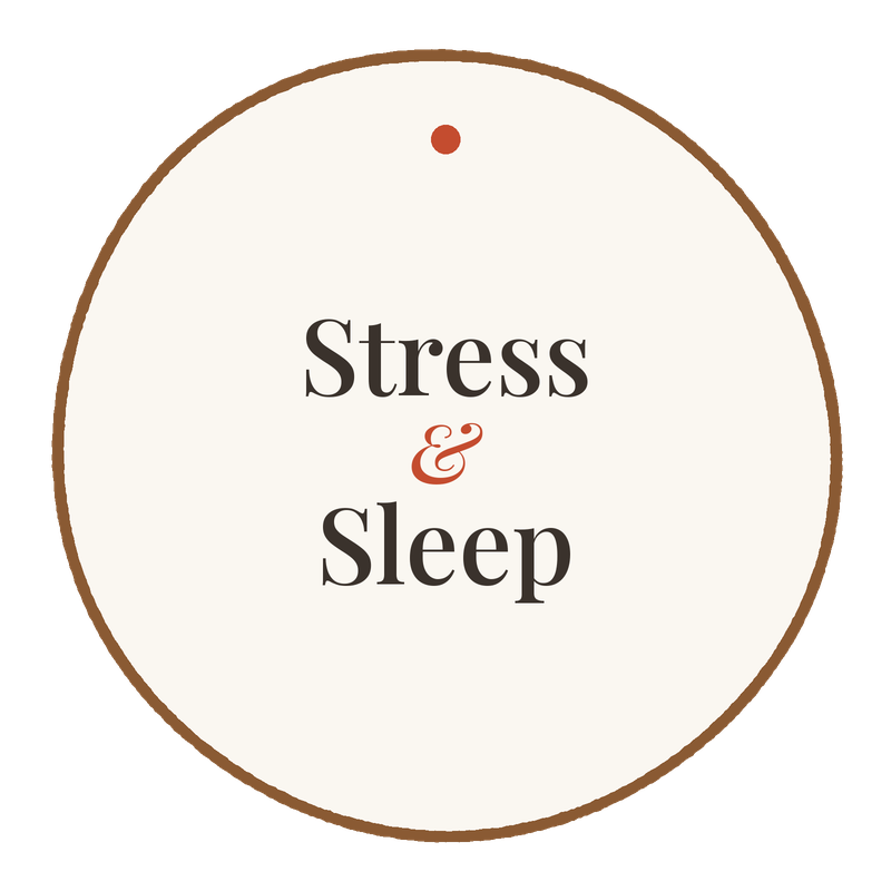 A circular sign with the words 'Stress & Sleep' in black text and a small red dot at the top.