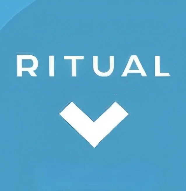 Blue background with the word 'RITUAL' and a downward-pointing check mark underneath