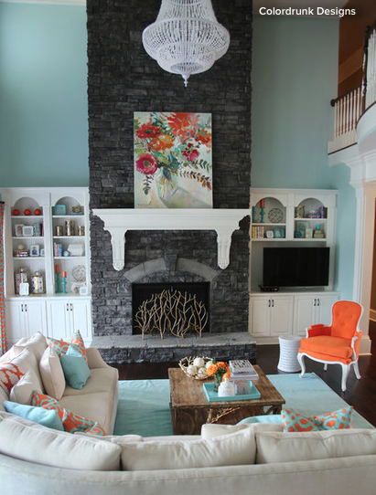 Living room with stone fireplace