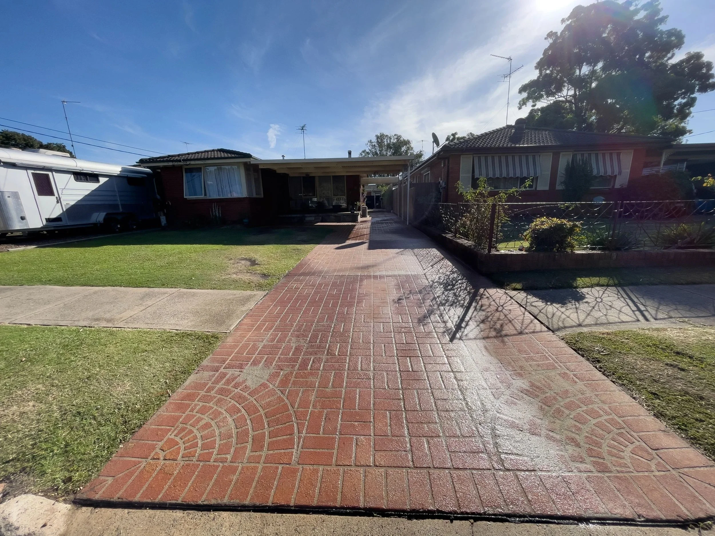 After Jakyl Services Front Driveway softwash clean