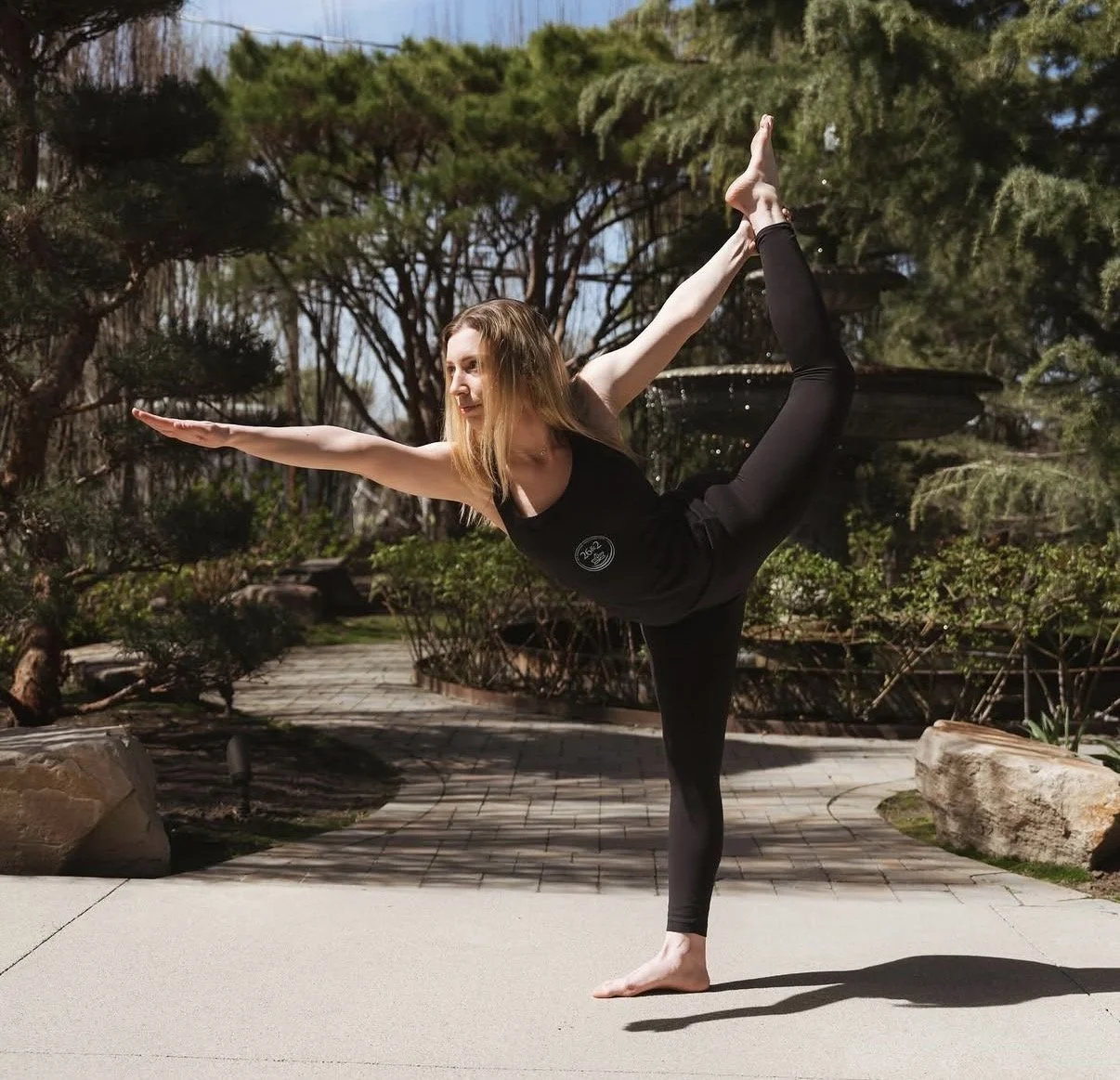 Vassiliki Pappas practicing yoga as part of a mind-body approach to mental health and wellness