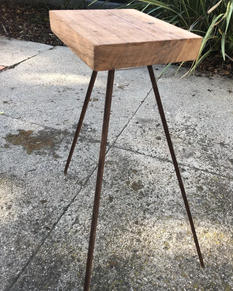 Mini book-sized table with three iron legs