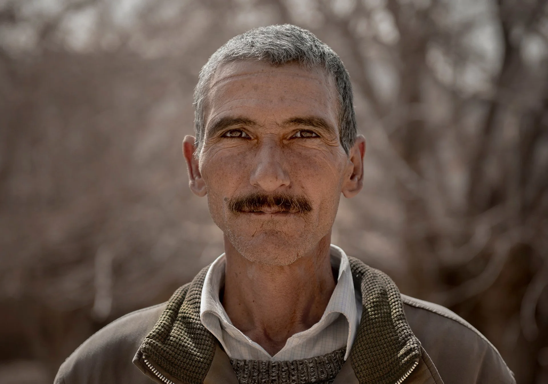 Close-up portrait of Iranian man