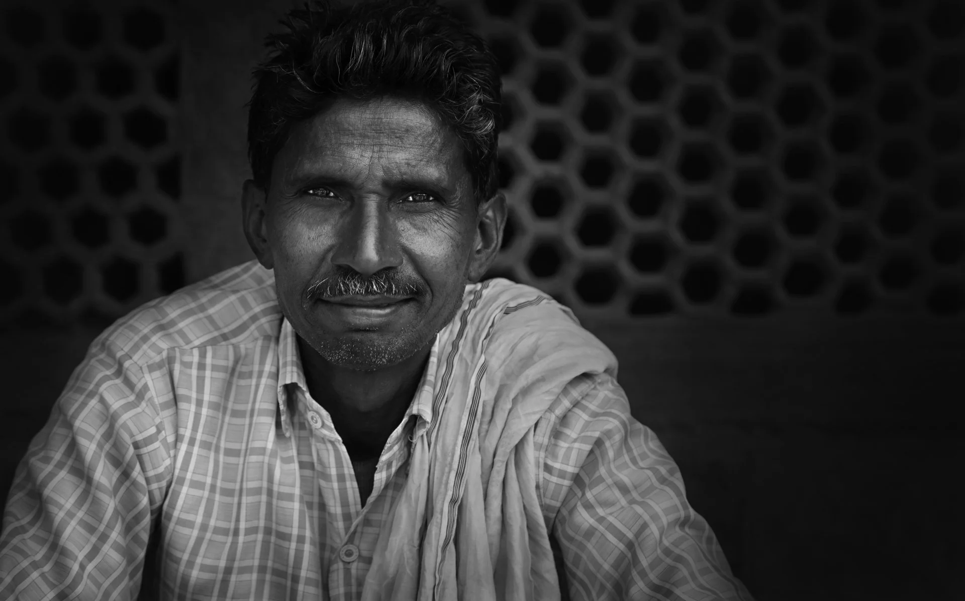Close-up portrait of an Indian man in the street, India