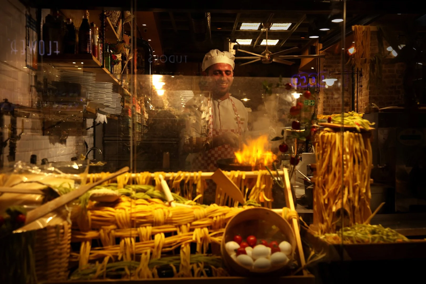 Portrait of a man standing in the restaurant and smiling, Istiklal Street, Turkey 
