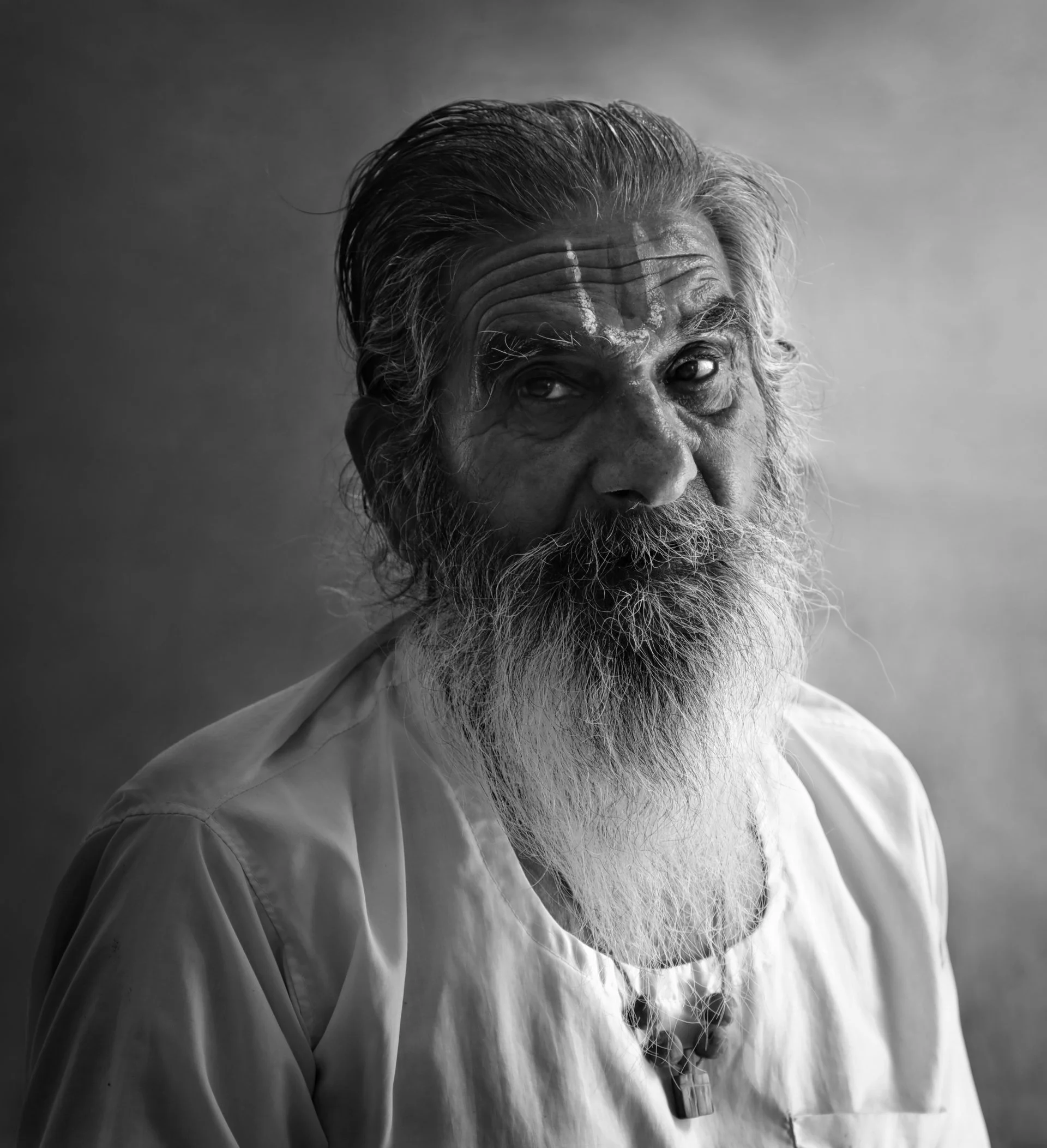 Close-up portrait of Indian man