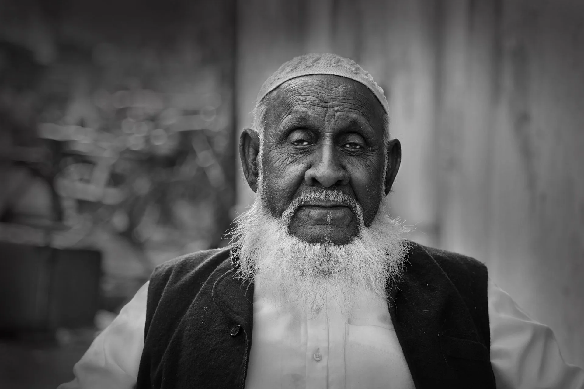 Close-up portrait of an Indian man in the street, India 