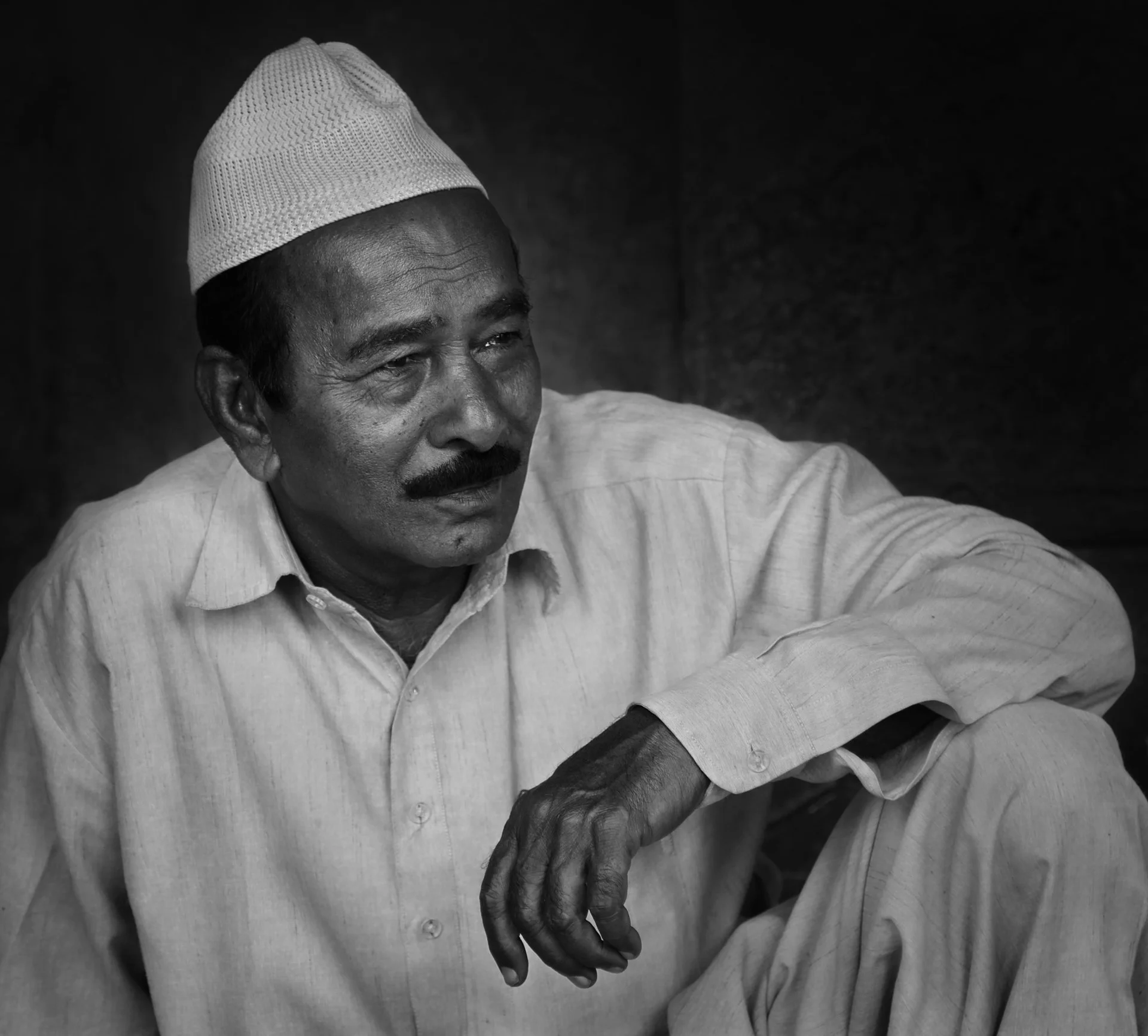 Close-up portrait of an Indian man in the street, India