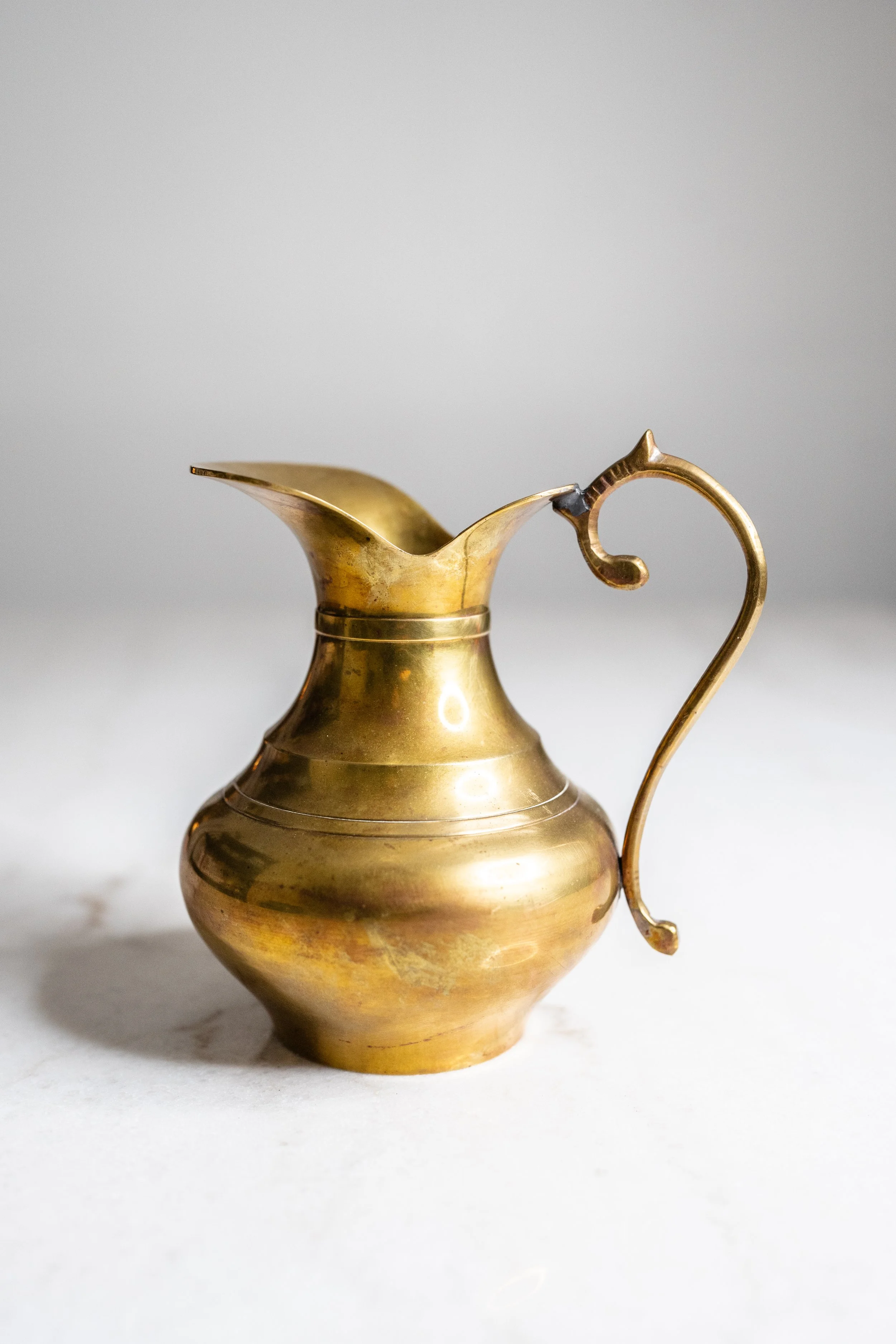 Vintage Solid Brass Pitcher with Ornate Scroll Handle