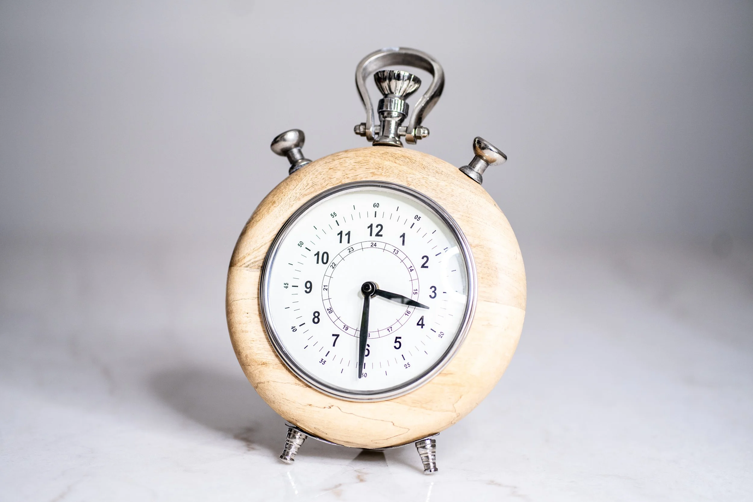 Rustic Round Wooden Mantel Clock with Chrome Accents