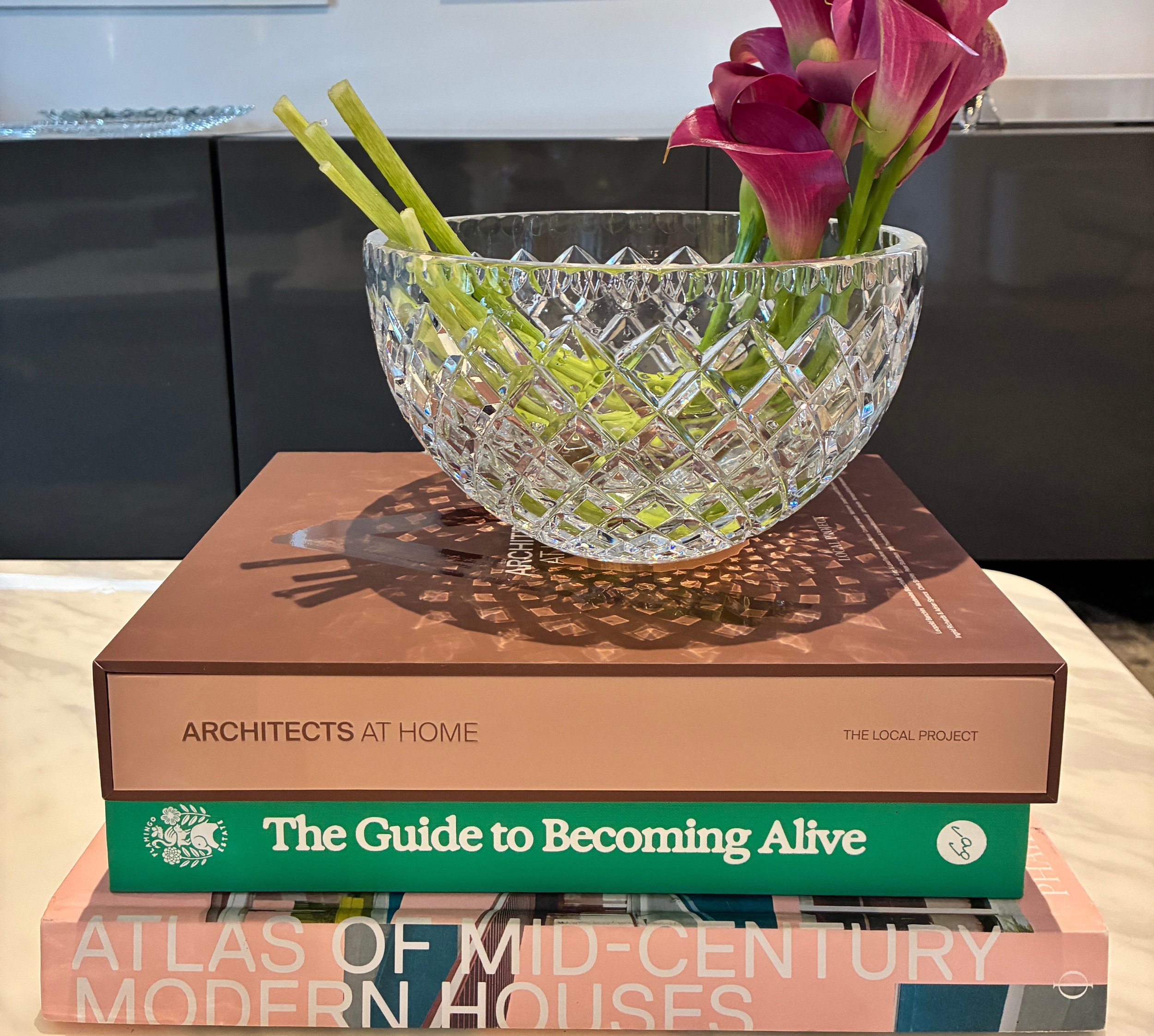 crystal bowl with flowers on books.jpg