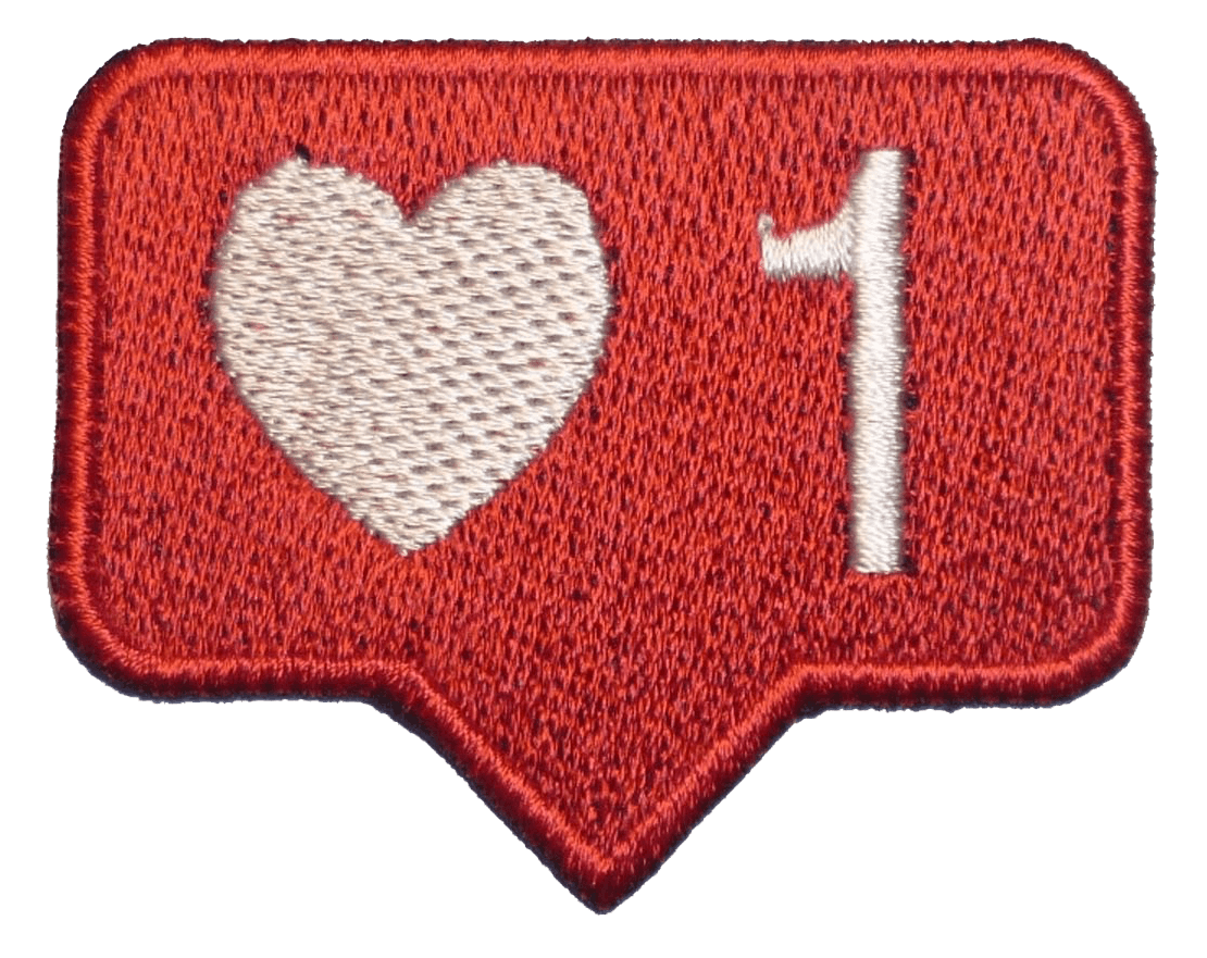 An embroidered patch with a red background, a white heart symbol, and a white number one, resembling a social media 'like' button.