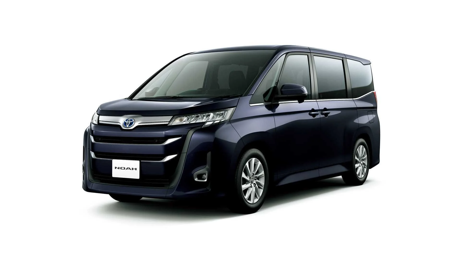 A dark blue Toyota Noah minivan facing slightly to the left with a white background.