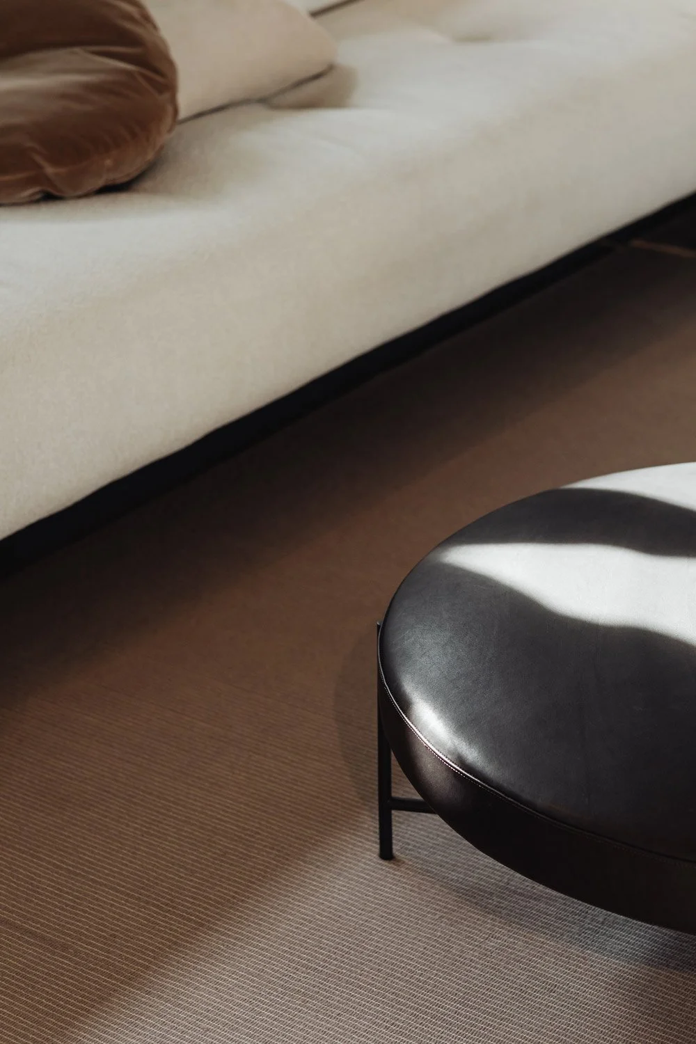 kaboompics_modern-living-space-with-soft-seating-and-a-round-black-coffee-table-37014.jpg