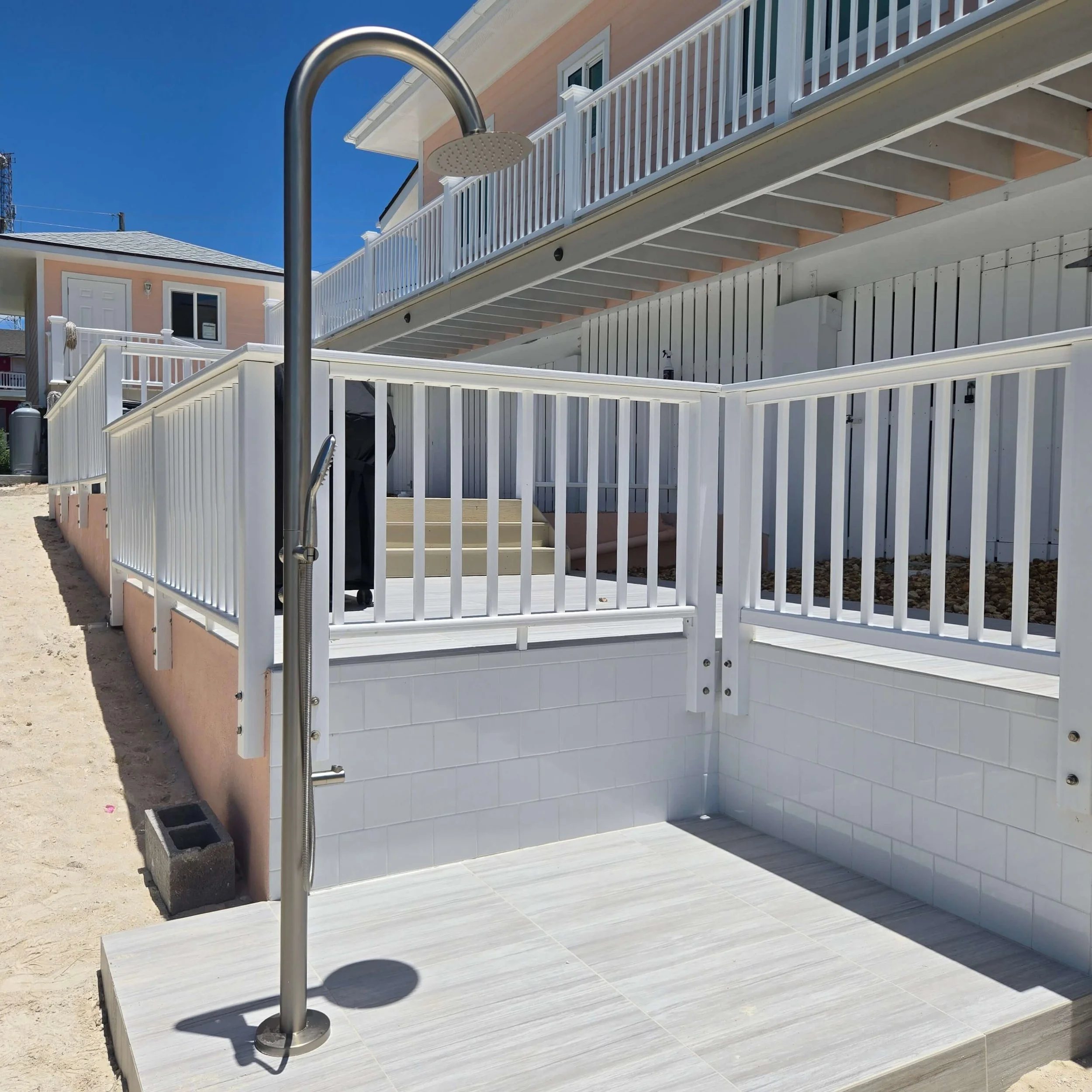 Seaside's outdoor shower and direct beach access.