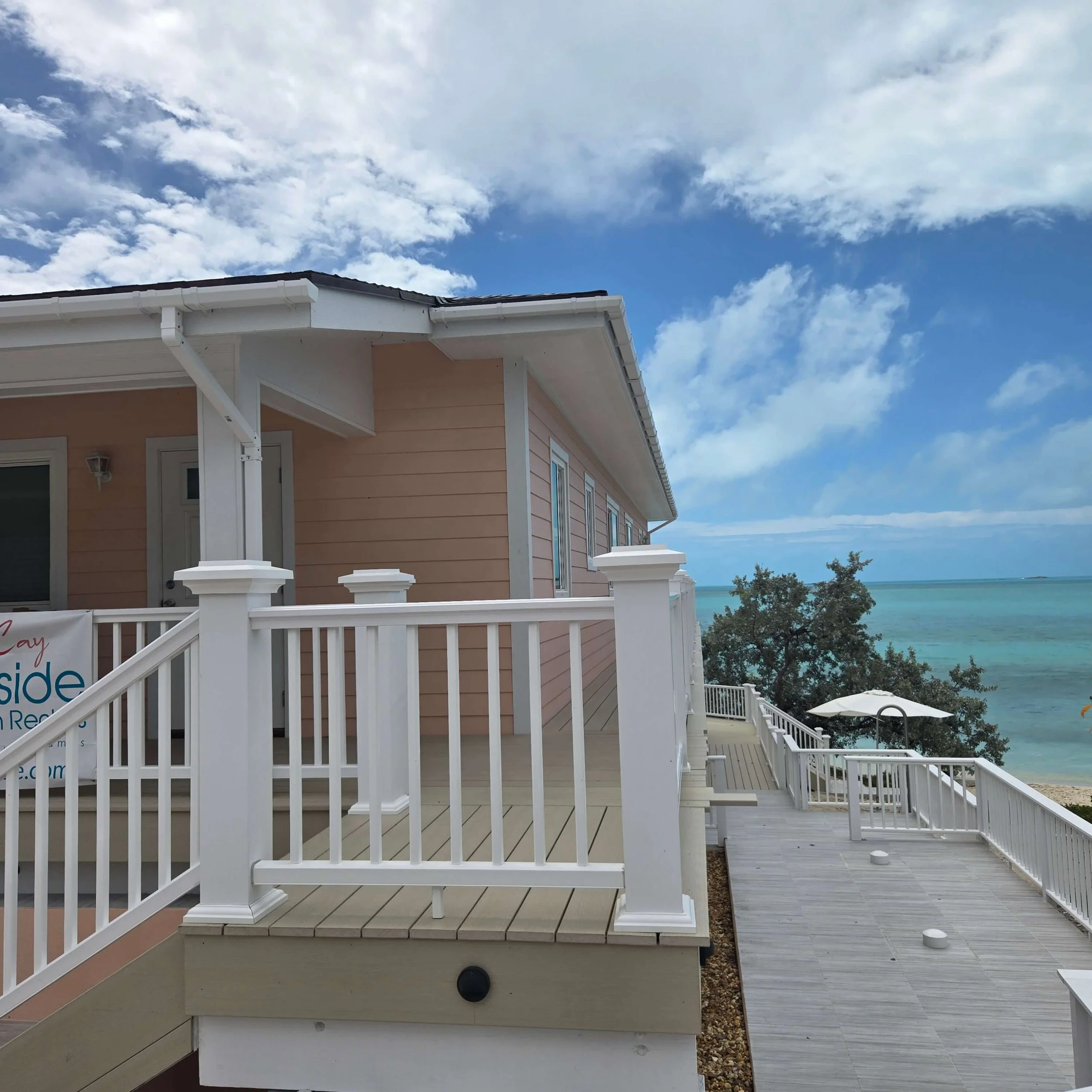 Sea Biscuit private entrance and covered porch at Seaside Vacation Rentals