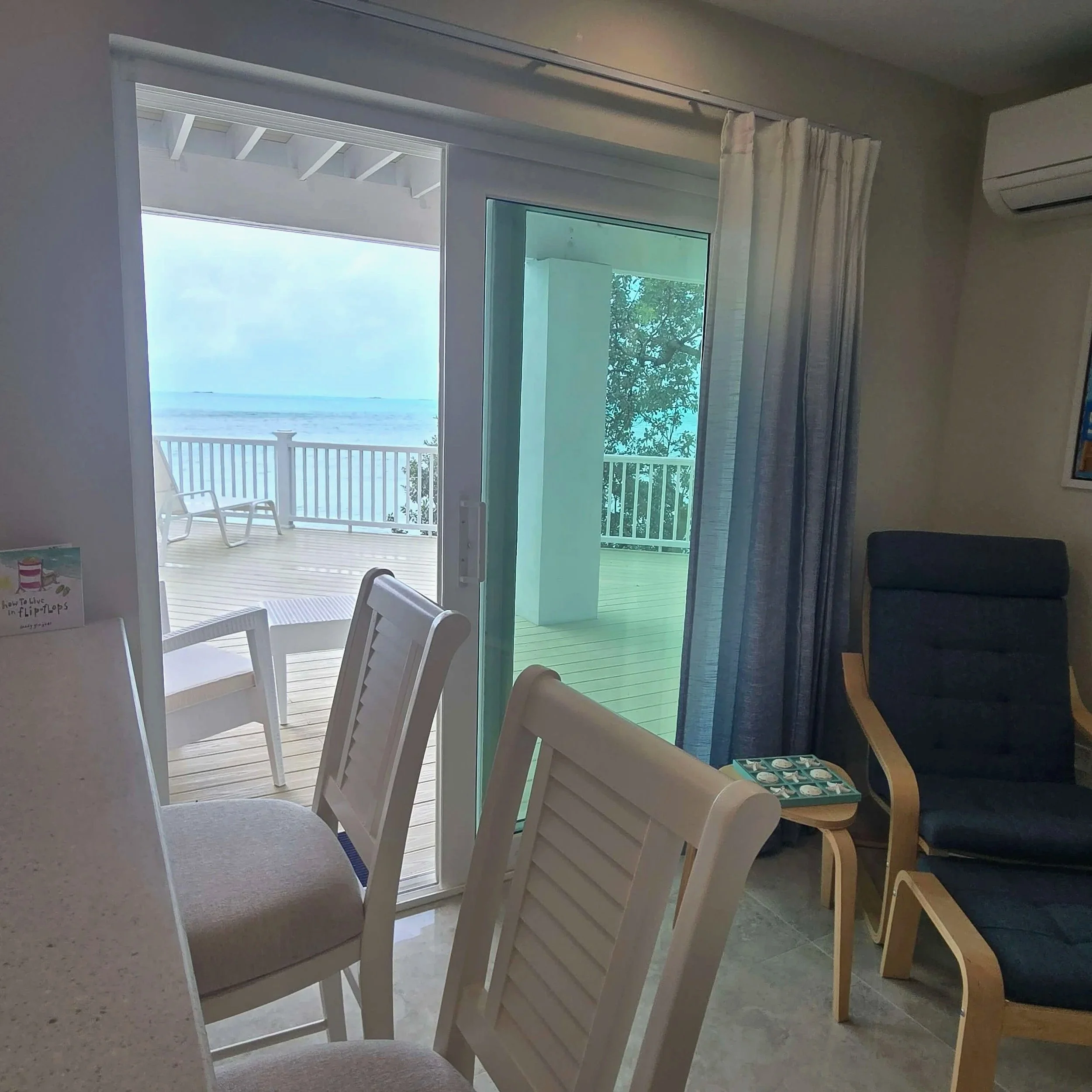 Sea Bean vacation rental modern interior with access to waterfront deck on Staniel Cay