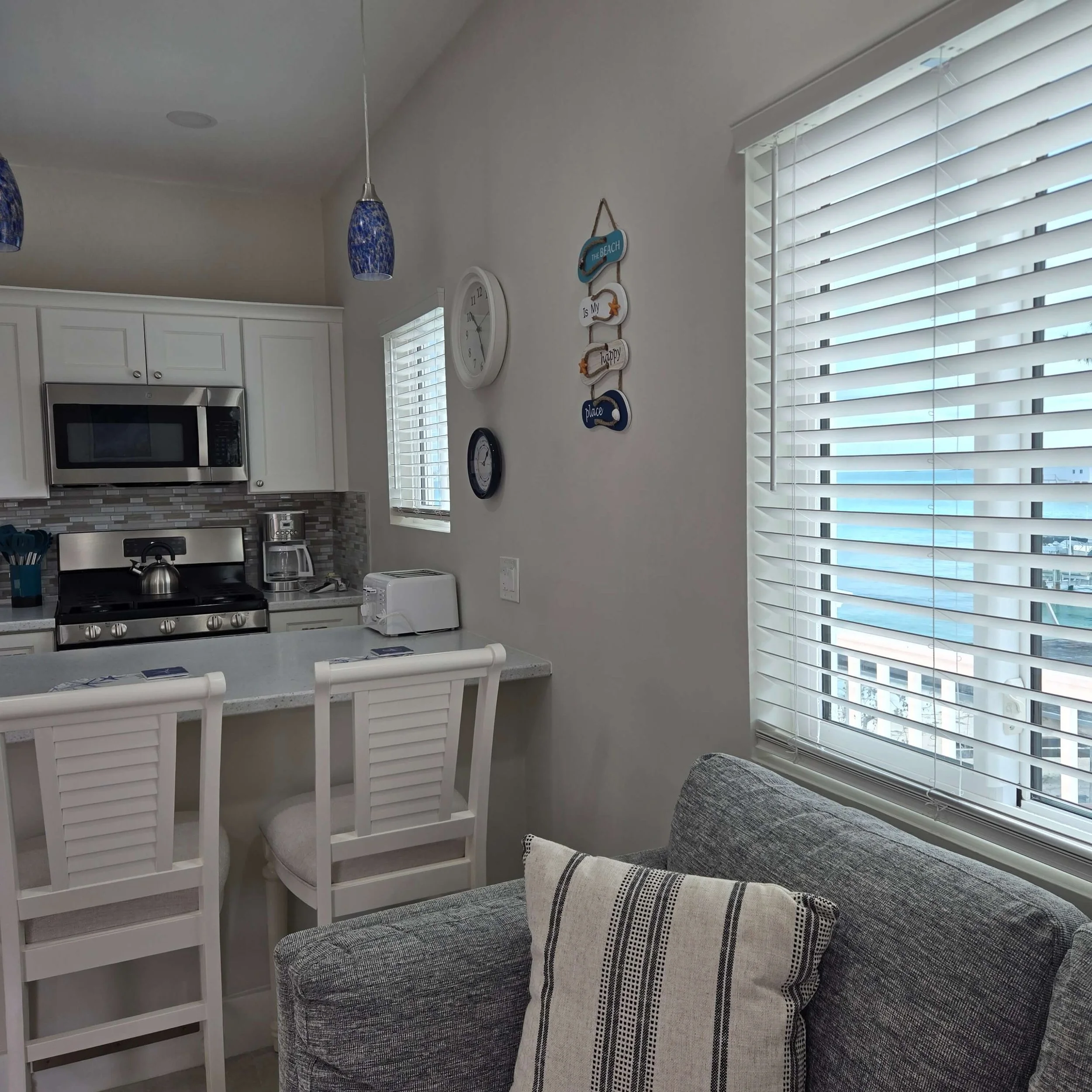 Sea Biscuit full kitchen and cozy living area in Staniel Cay