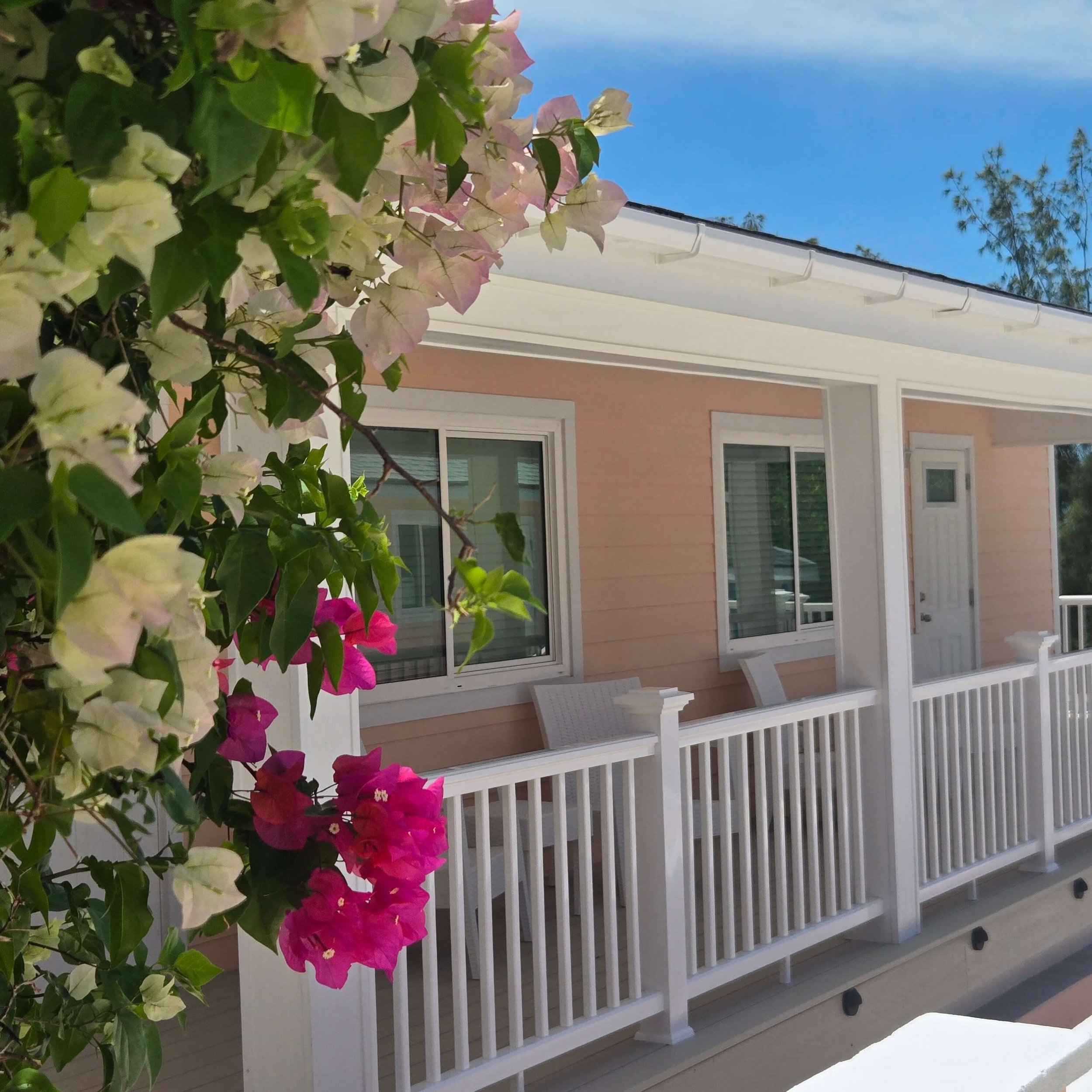 Staniel Cay Seaside Vacation Rentals porch featuring flowering bougainvillea