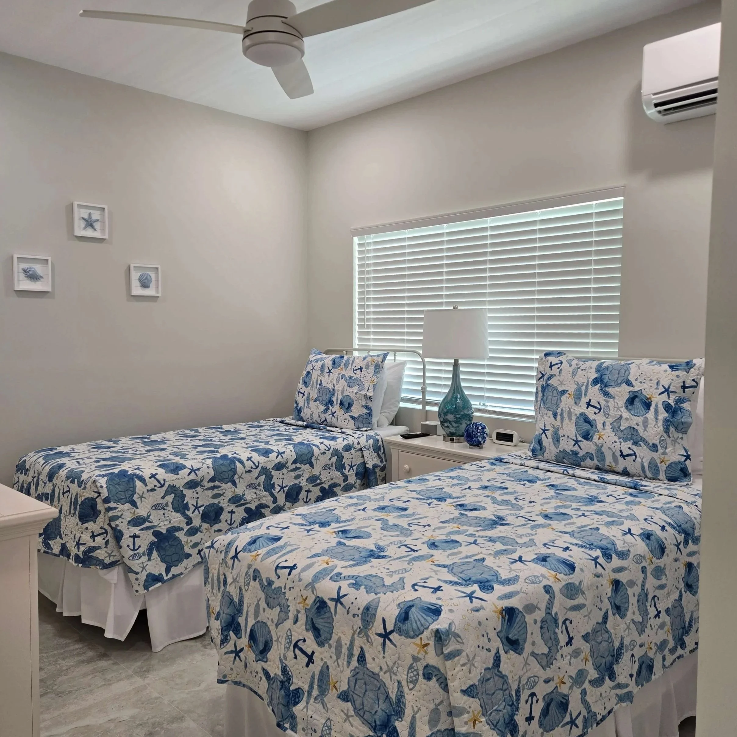 Modern coastal bedroom in a Staniel Cay vacation rental