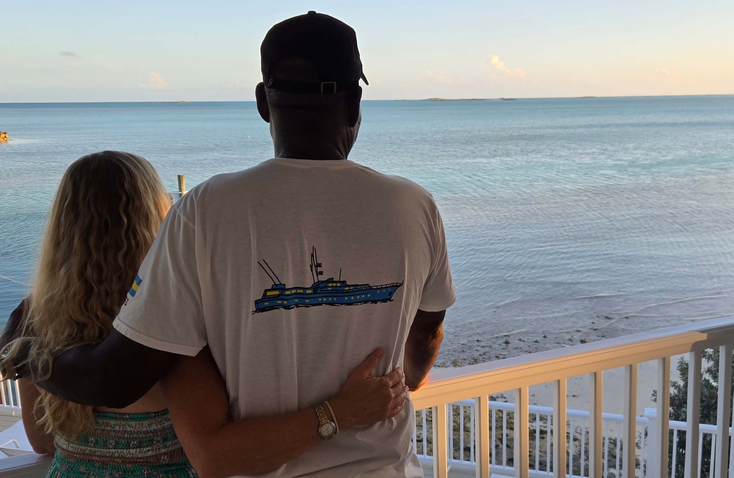 Staniel Cat Seaside's owners looking out at the ocean