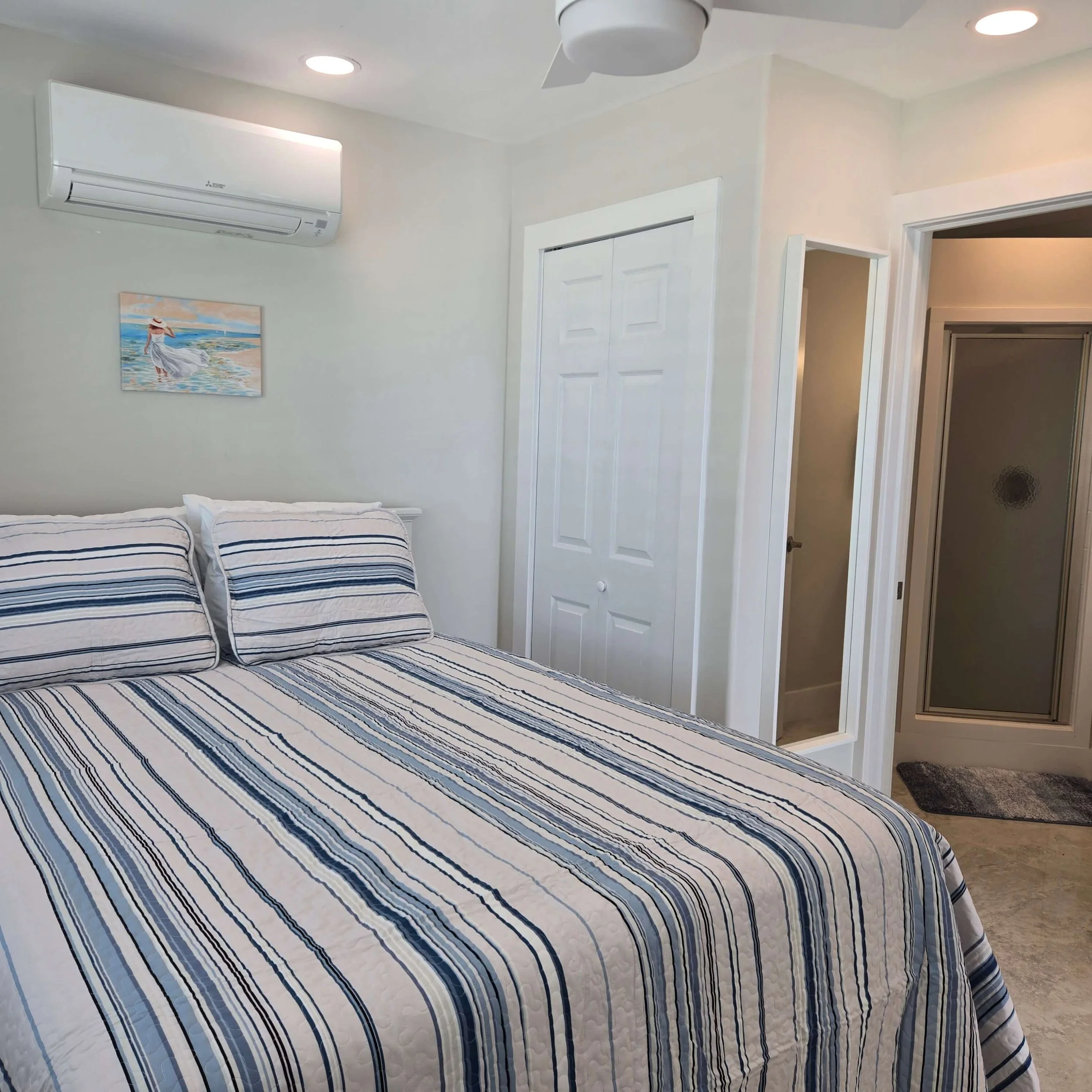 Queen bedroom in Sea Bean oceanfront Staniel Cay rental