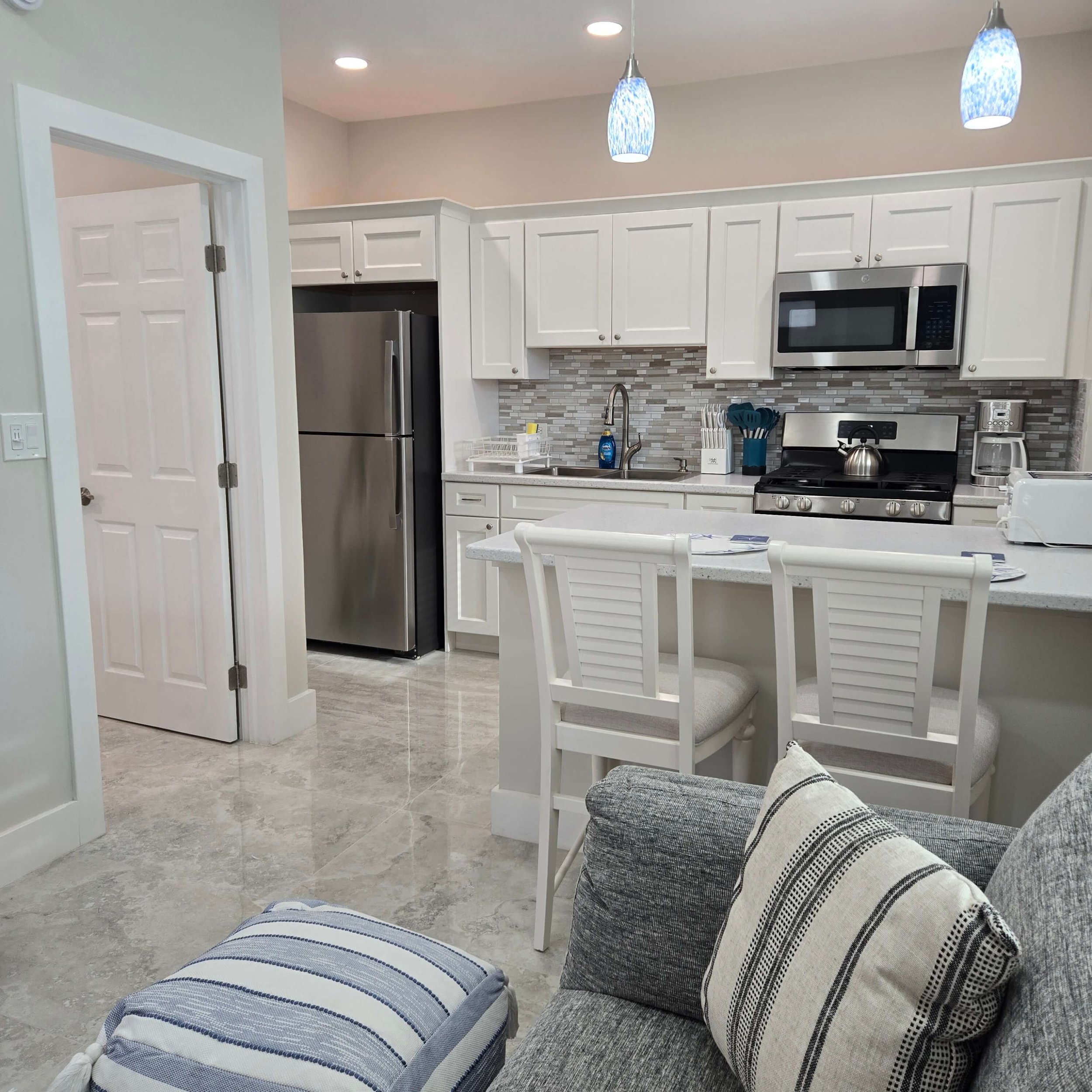 Full modern kitchen inside the Sea Biscuit vacation rental unit 