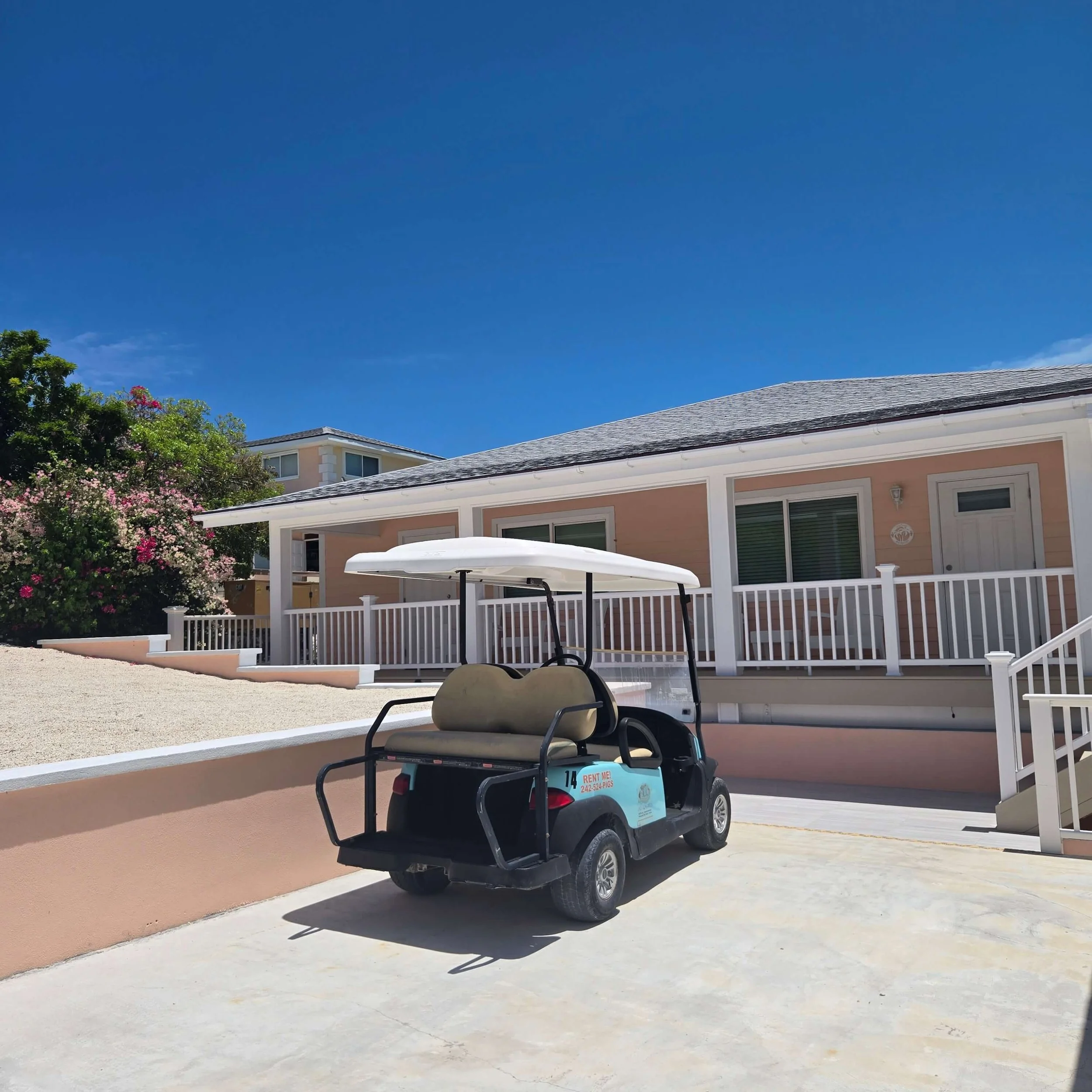 Golf cart parking at Staniel Cay Seaside Vacation Rentals