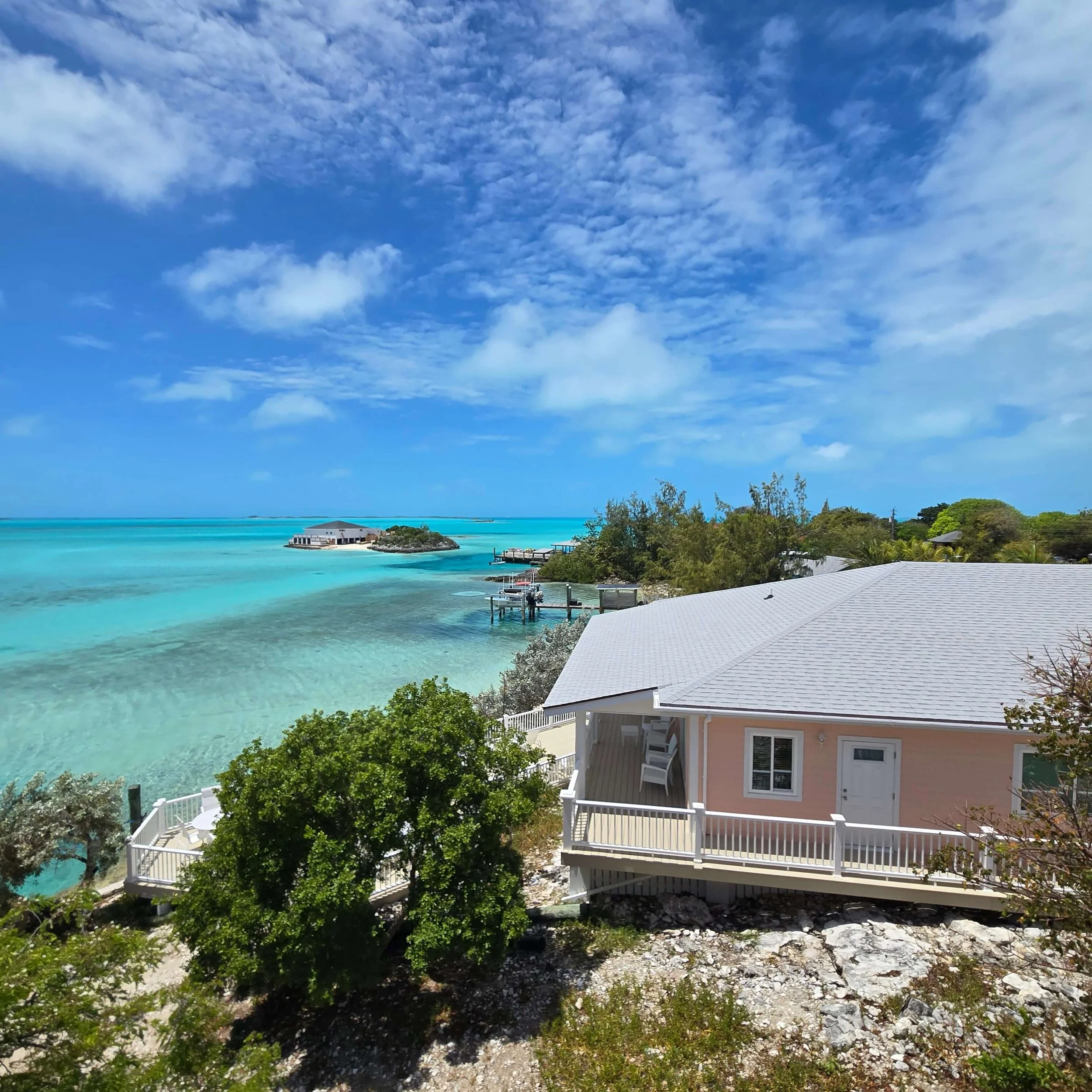 Oceanfront vacation rentals overlooking turquoise water in Staniel Cay Bahamas