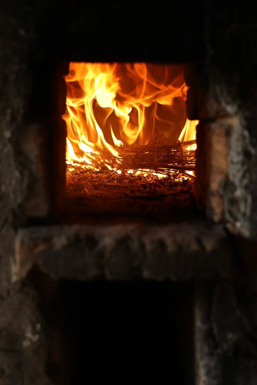 Fire transforms, reducing all to its purest essence