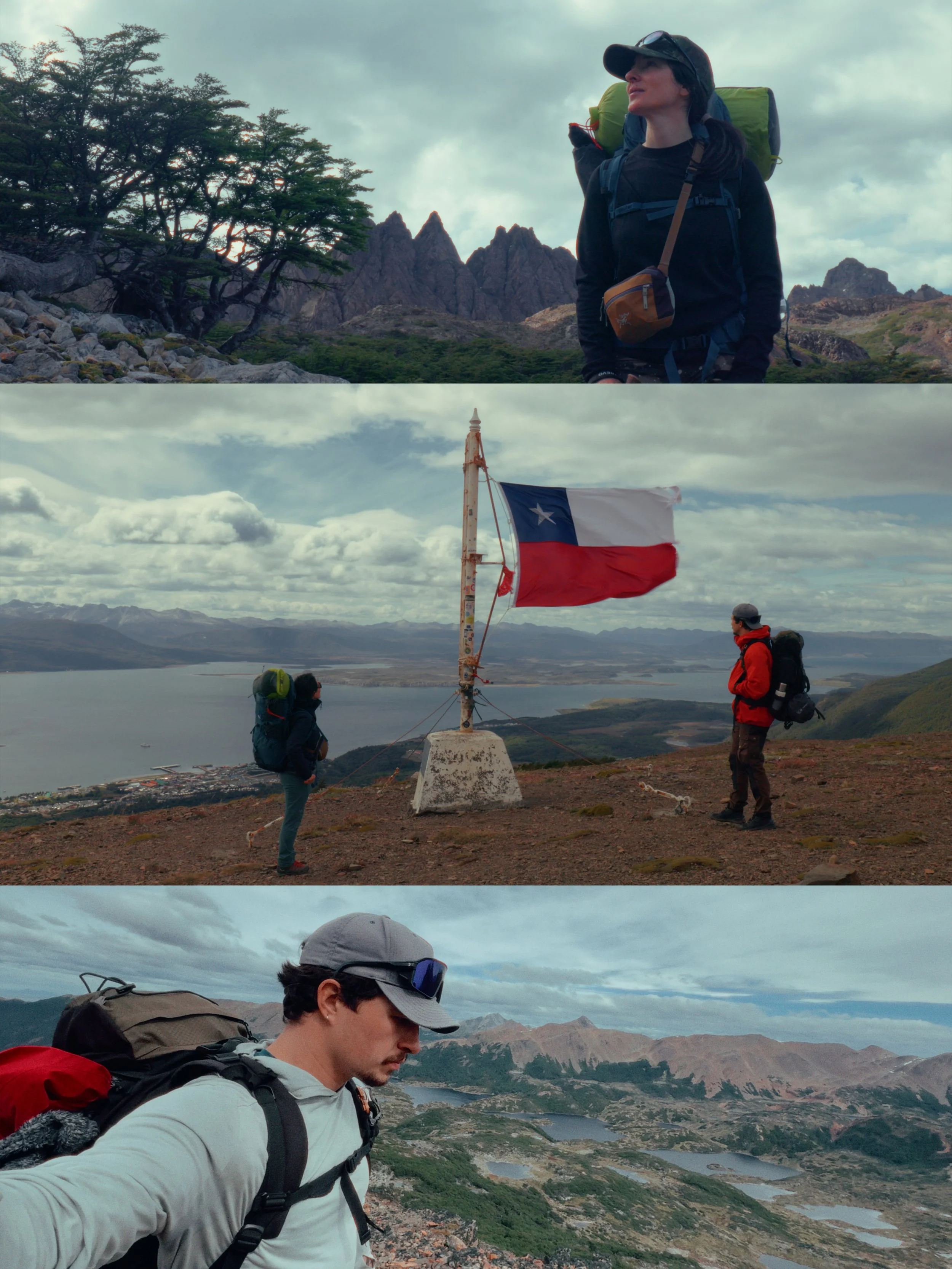 Four hikers on a mountain trail with backpacks and gear, standing near a flagpole with the Texas state flag, overlooking a scenic landscape of lakes and mountains under a cloudy sky.